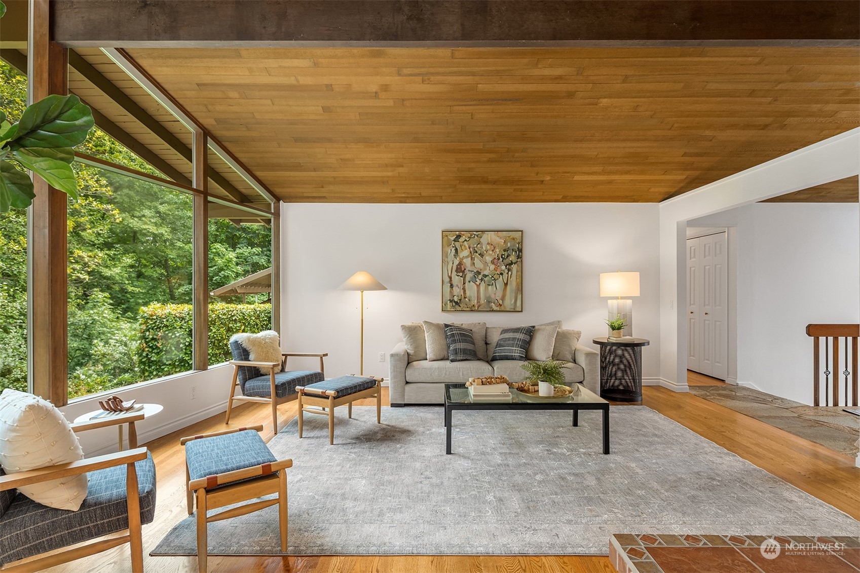 4448 144th Avenue Southeast Bellevue, WA 98006 - Photo 13 of 40 a living room with furniture and a large window