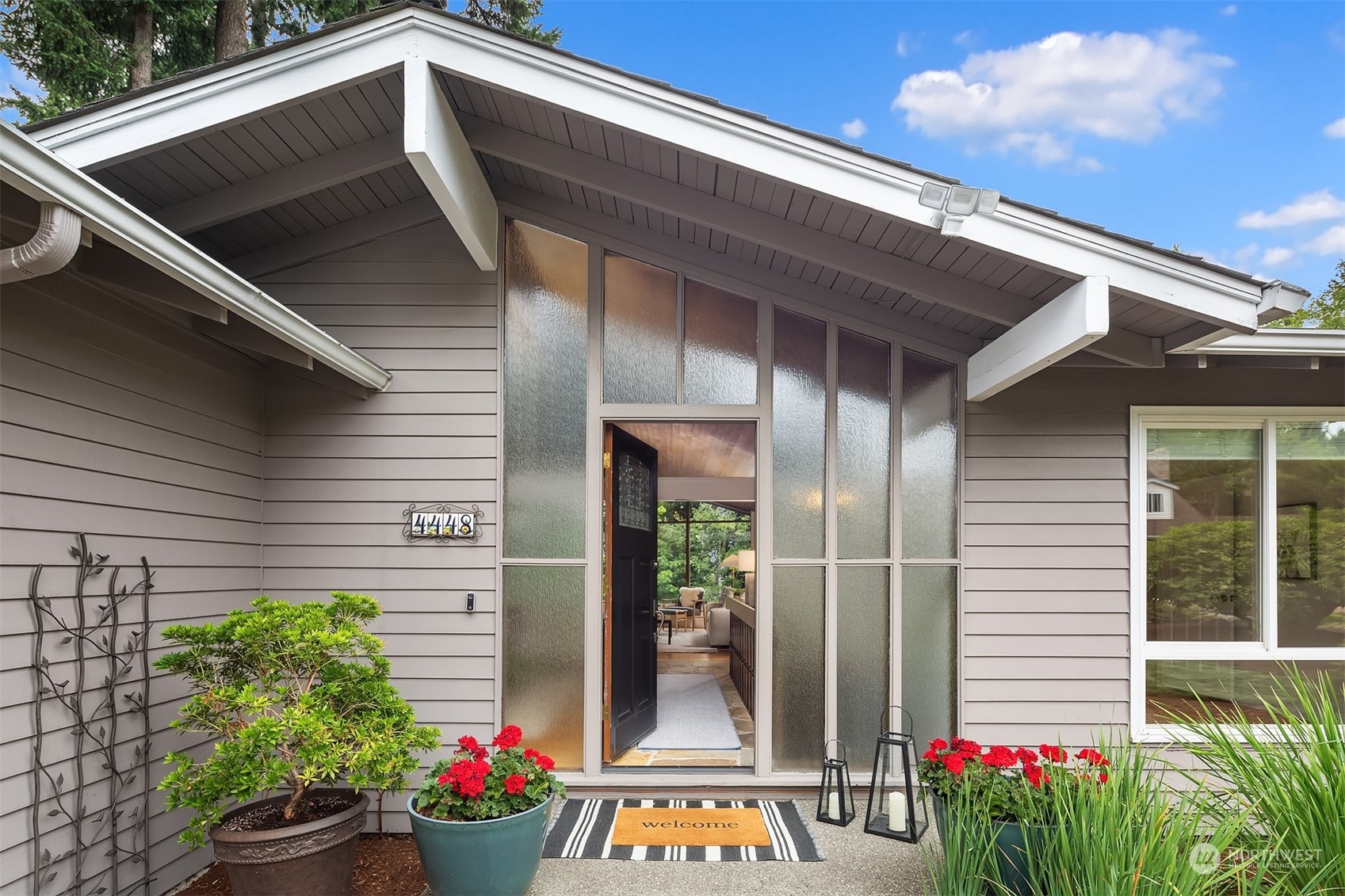 4448 144th Avenue Southeast Bellevue, WA 98006 - Photo 2 of 40 a front view of a house
