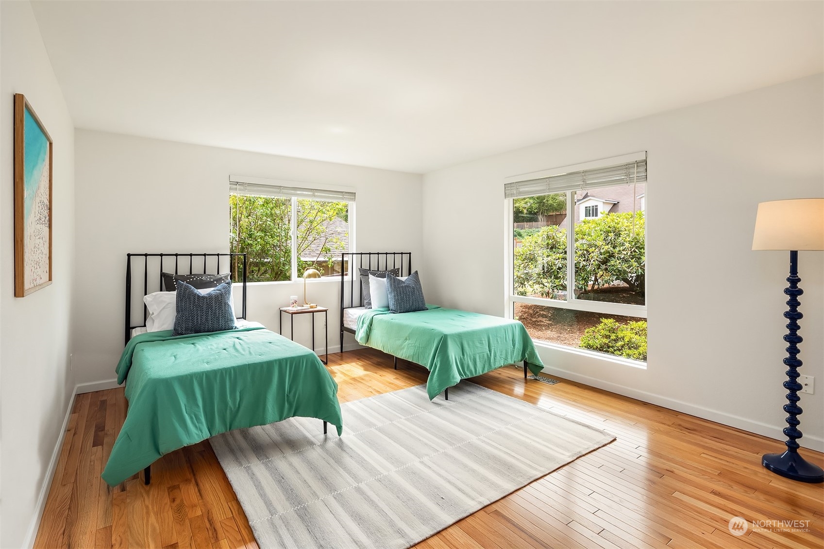 4448 144th Avenue Southeast Bellevue, WA 98006 - Photo 21 of 40 a bedroom with a bed and a window