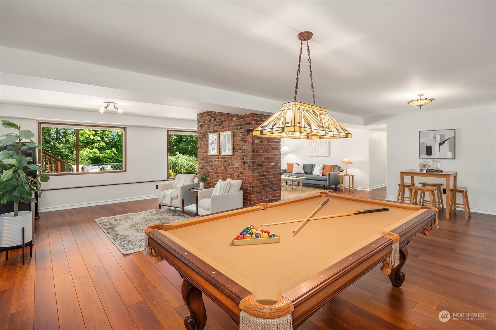 4448 144th Avenue Southeast Bellevue, WA 98006 - Photo 25 of 40 a room with pool table and windows