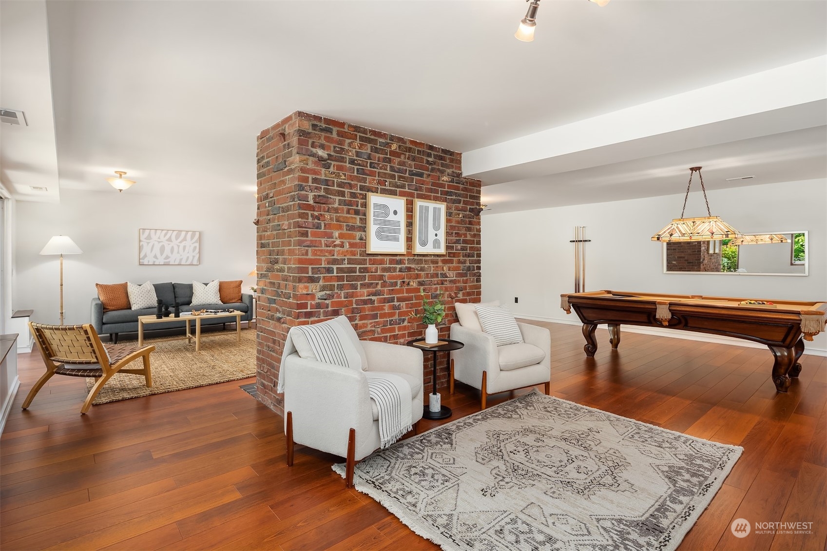 4448 144th Avenue Southeast Bellevue, WA 98006 - Photo 27 of 40 a living room with furniture and wooden floor