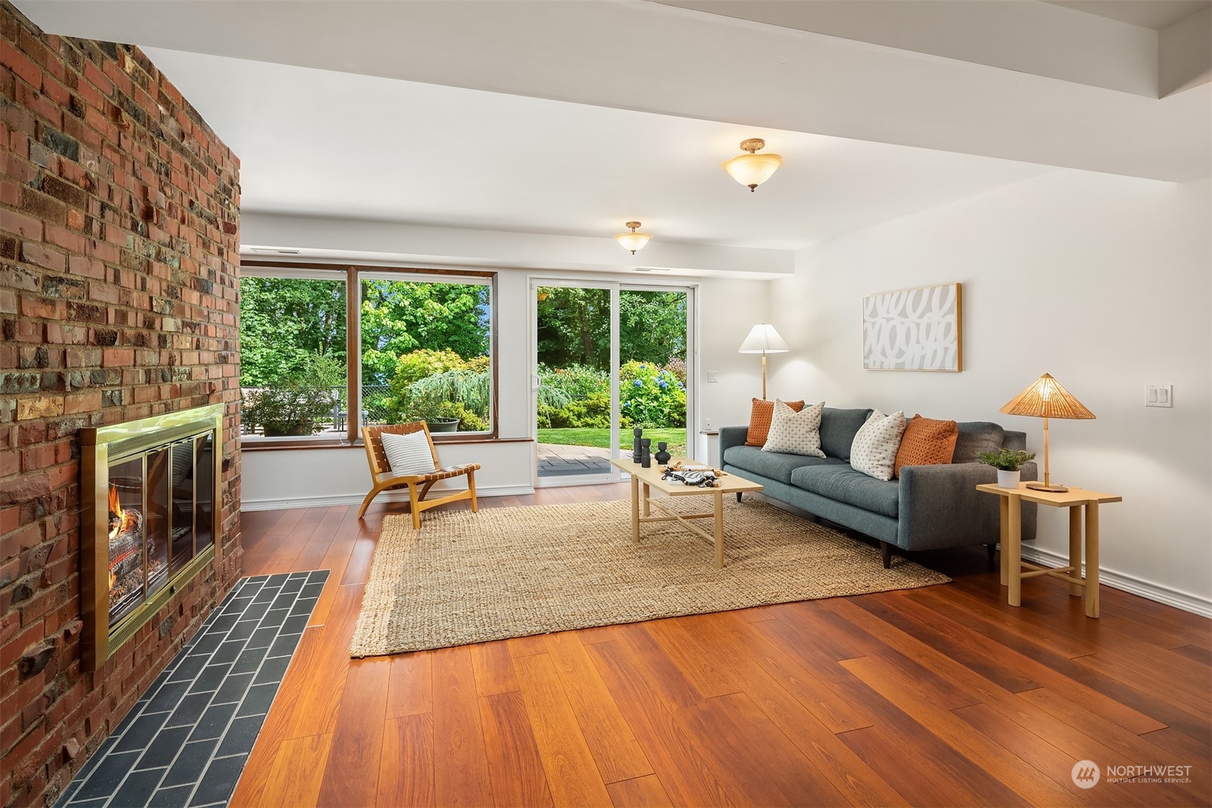 4448 144th Avenue Southeast Bellevue, WA 98006 - Photo 28 of 40 a living room with furniture and a fireplace