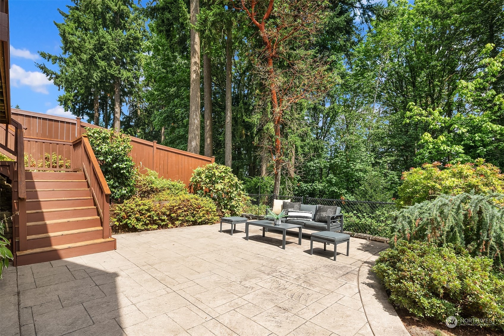 4448 144th Avenue Southeast Bellevue, WA 98006 - Photo 34 of 40 a view of a backyard with sitting area