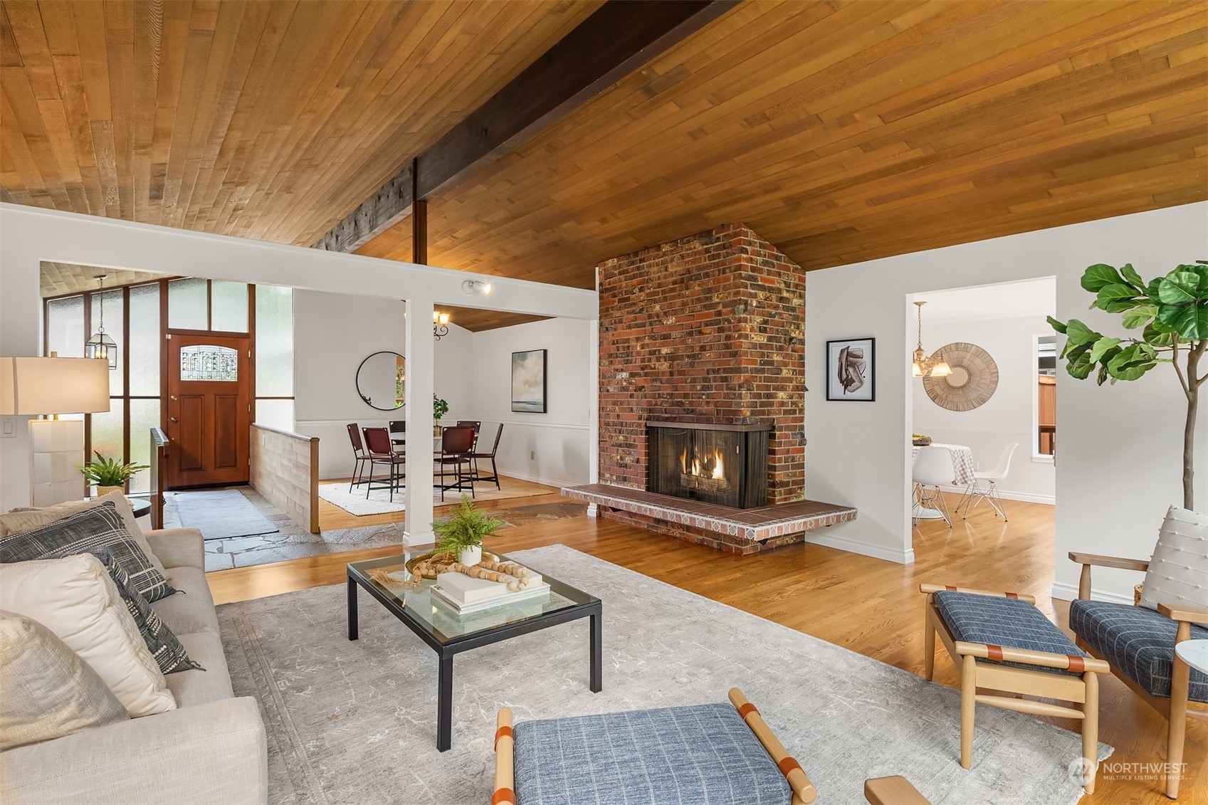 4448 144th Avenue Southeast Bellevue, WA 98006 - Photo 6 of 40 a living room with furniture and a fireplace
