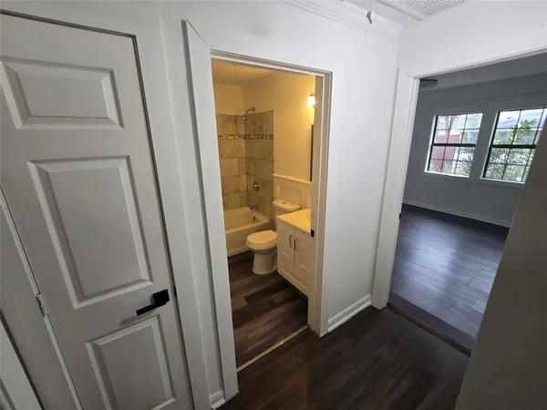 a bathroom with a sink and toilet