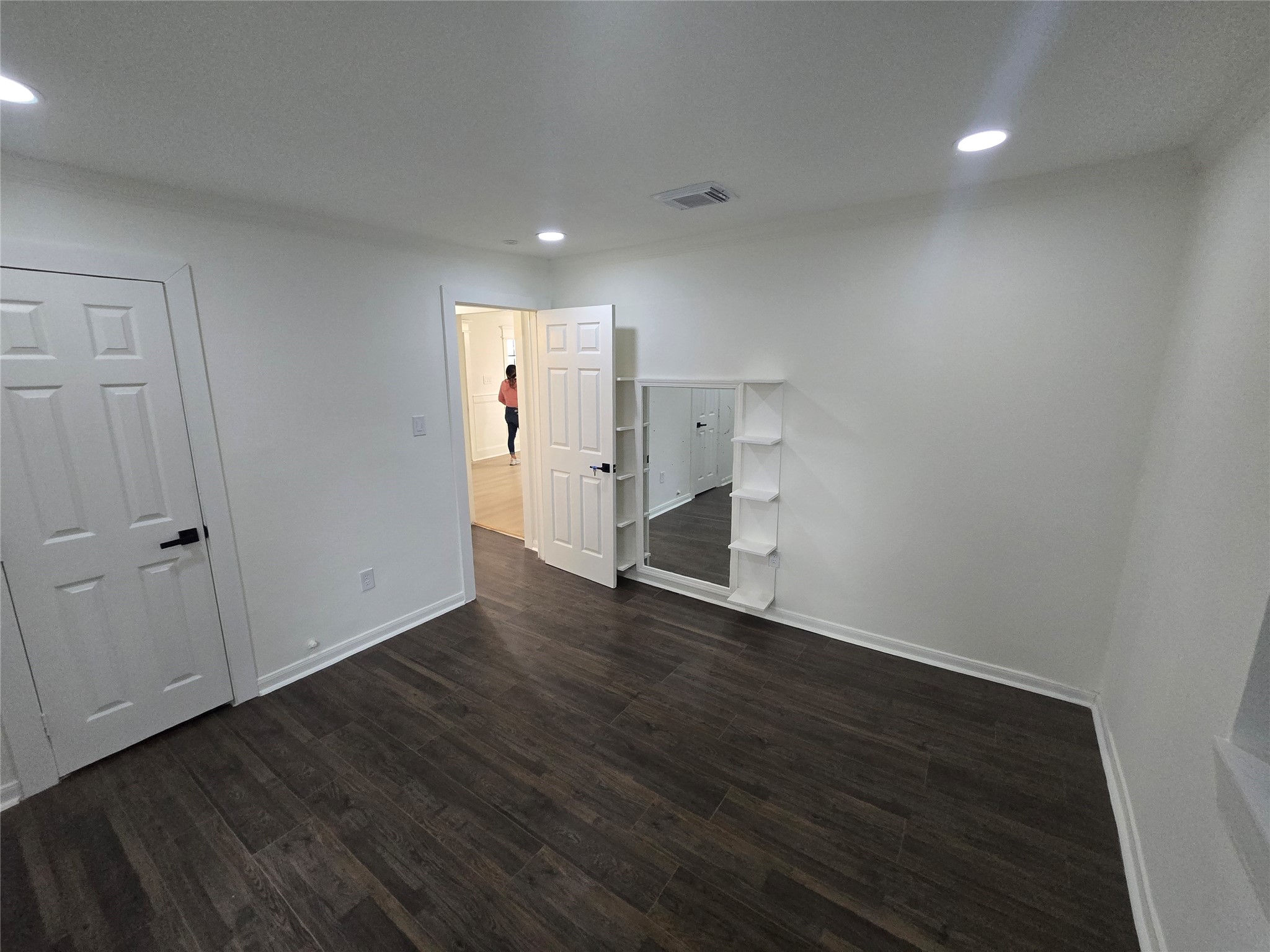9254 Haddick Street Houston, TX 77028 - Photo 15 of 18 a view of empty room with wooden floor
