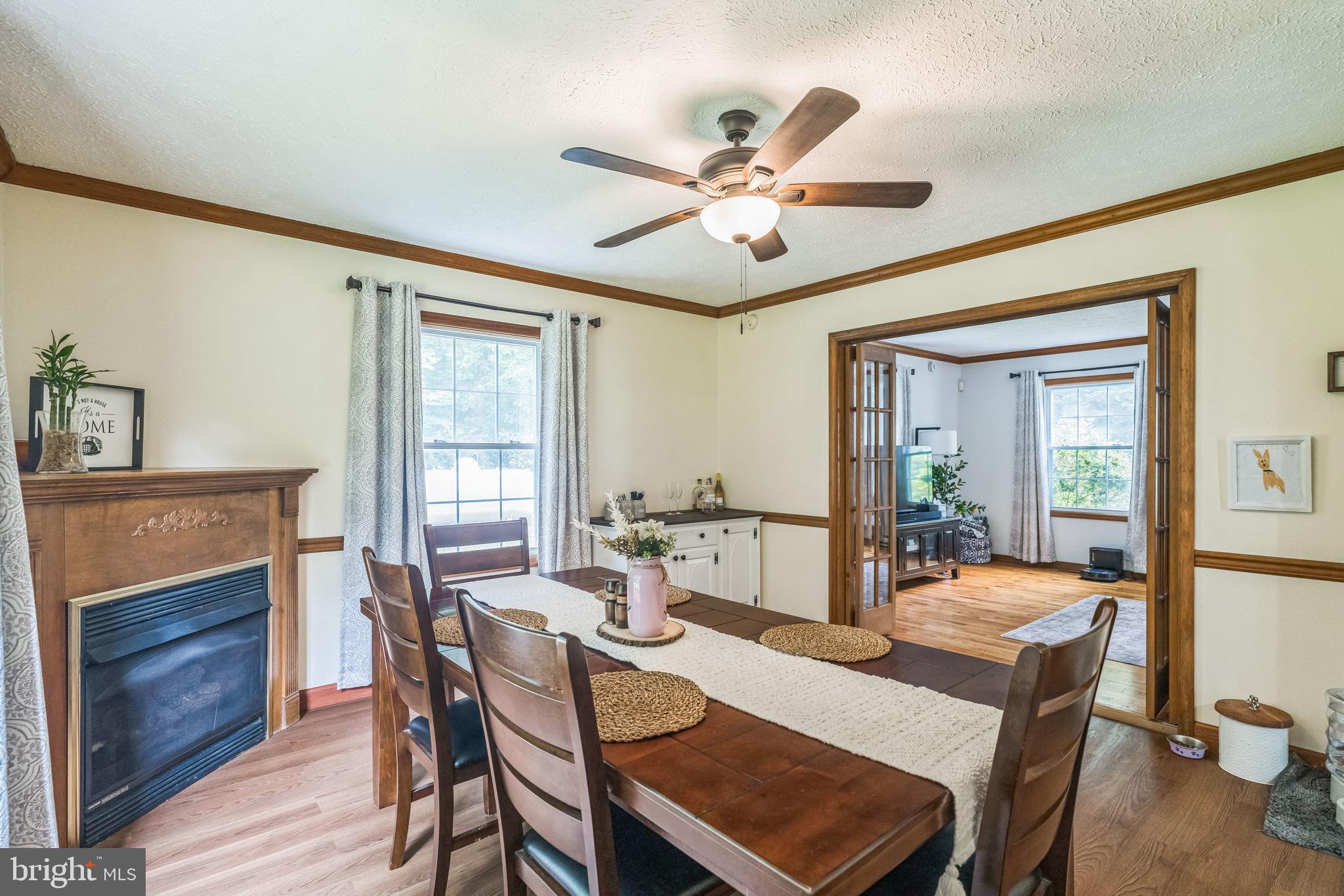 17 Oaklawn Drive Parkesburg, PA 19365 - Photo 13 of 45 a view of a dining room with furniture window and wooden floor