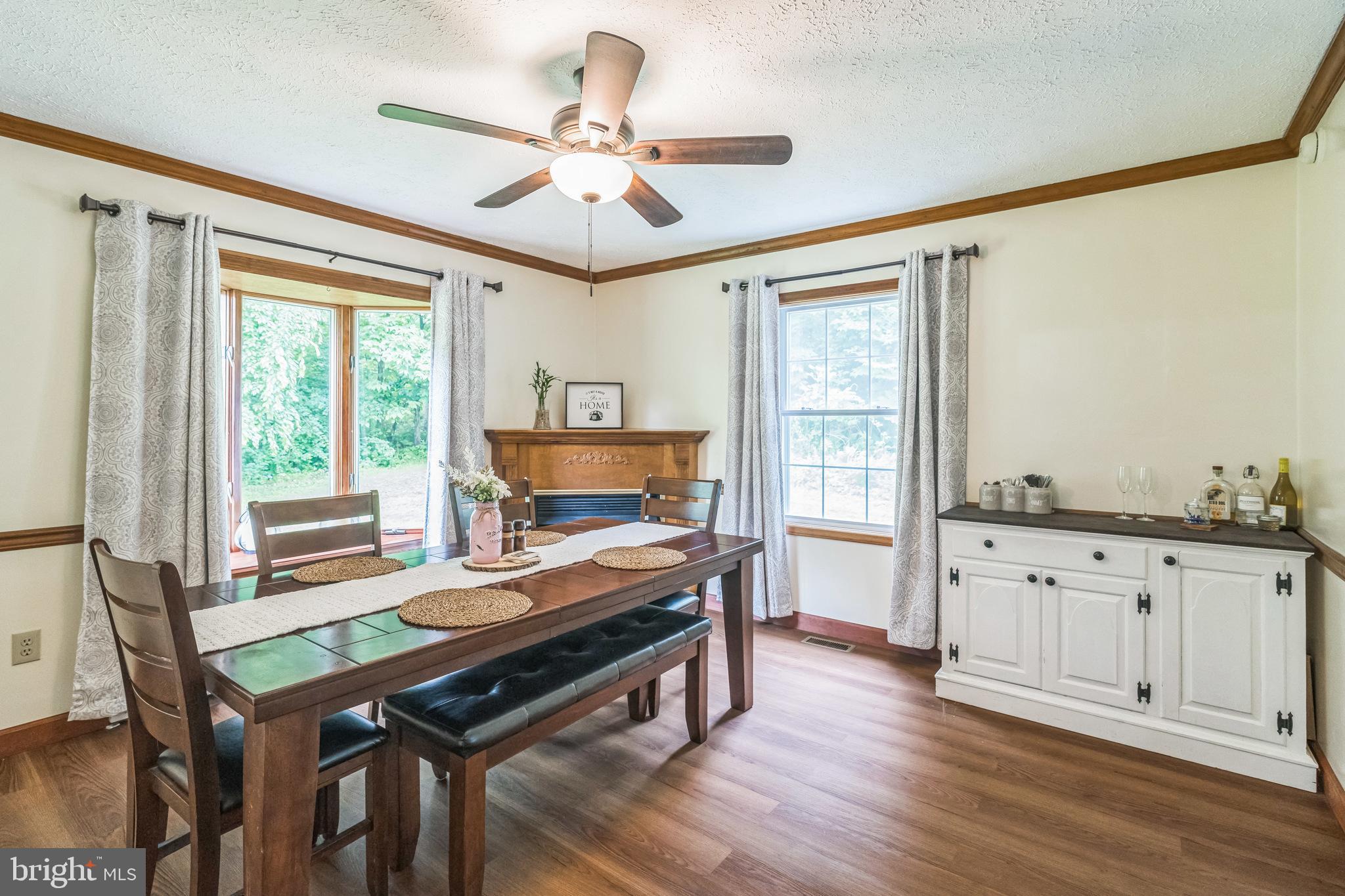17 Oaklawn Drive Parkesburg, PA 19365 - Photo 14 of 45 a living room with furniture a fireplace and a window