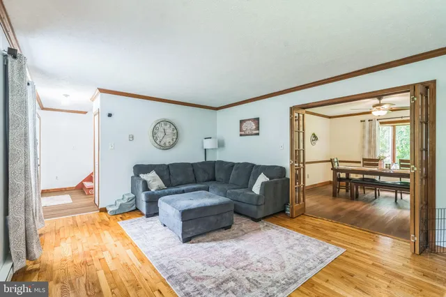a living room with furniture and a table