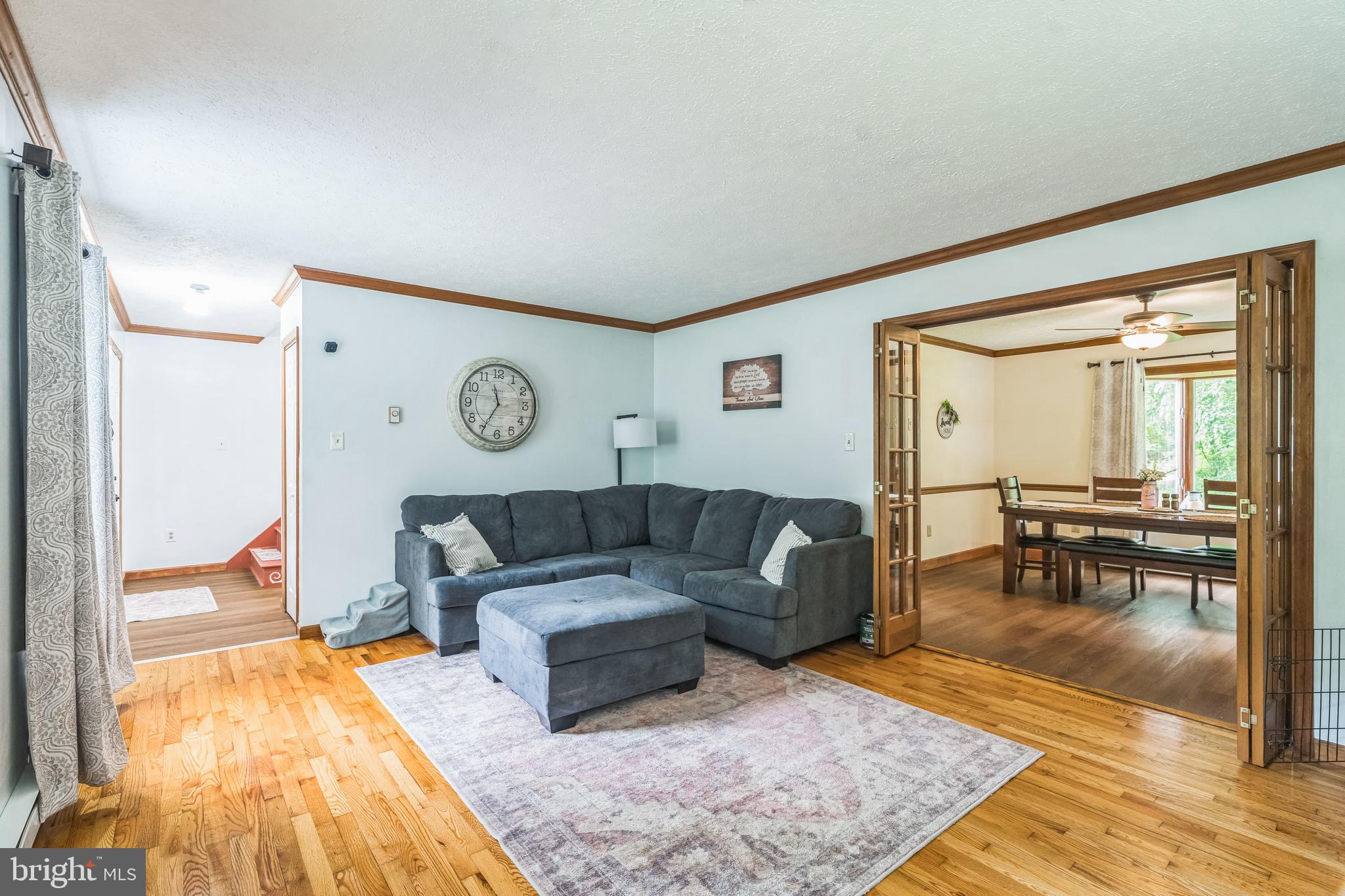 17 Oaklawn Drive Parkesburg, PA 19365 - Photo 16 of 45 a living room with furniture and a table