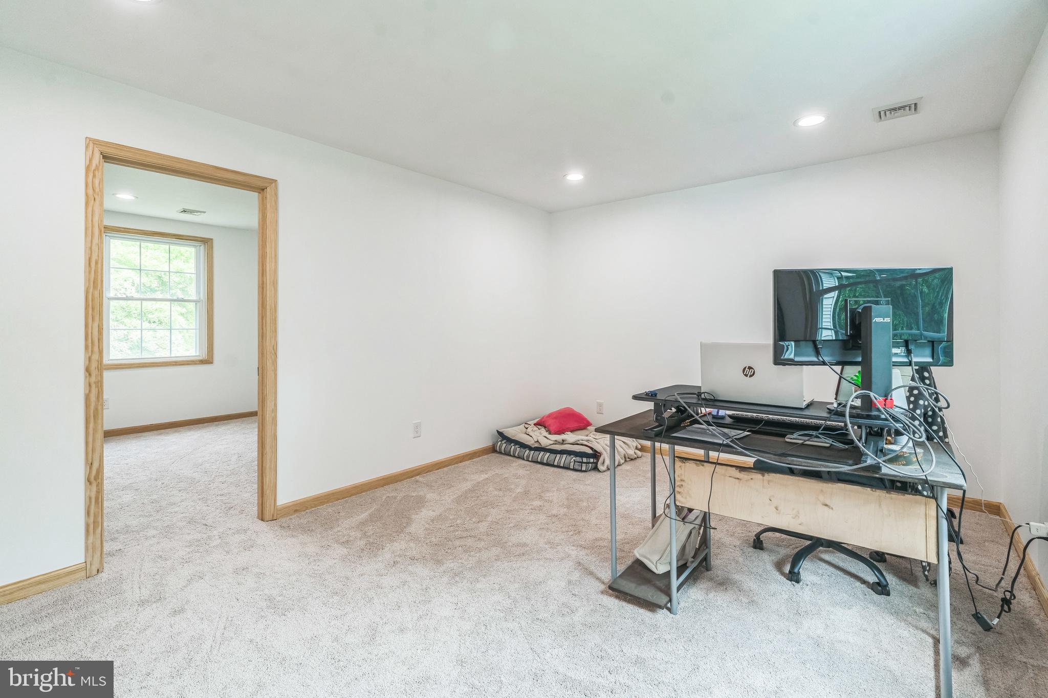 17 Oaklawn Drive Parkesburg, PA 19365 - Photo 18 of 45 a room with gym equipment and view of living room