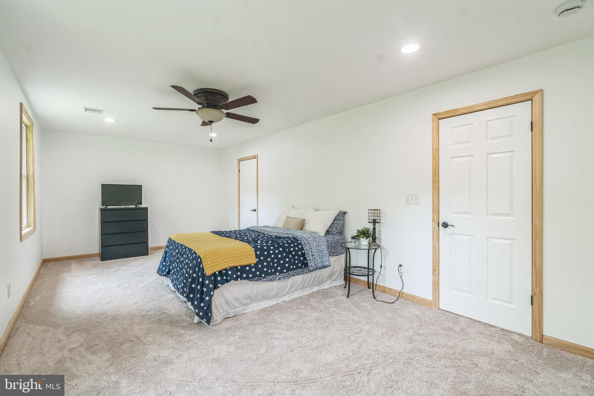 17 Oaklawn Drive Parkesburg, PA 19365 - Photo 20 of 45 a living room with furniture and a ceiling fan