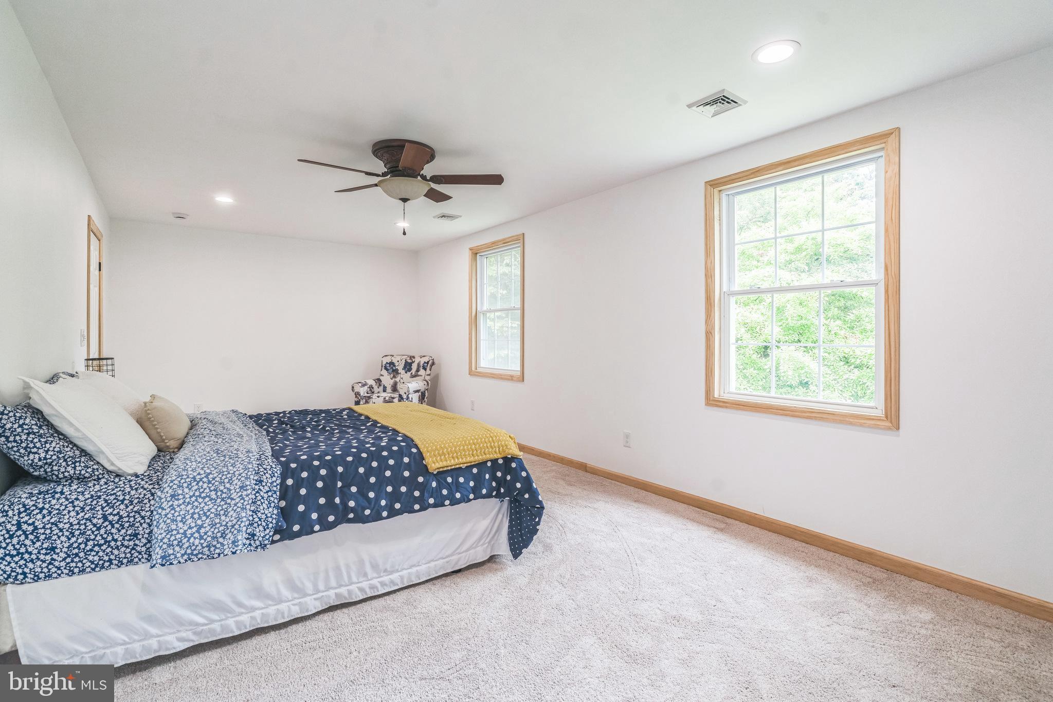 17 Oaklawn Drive Parkesburg, PA 19365 - Photo 21 of 45 a bedroom with a bed and window