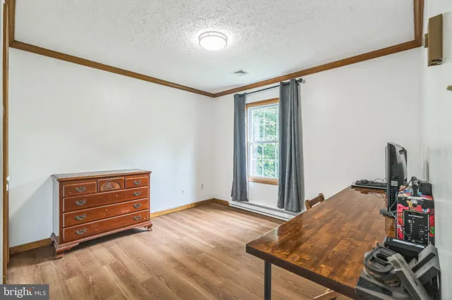 a room with furniture and window