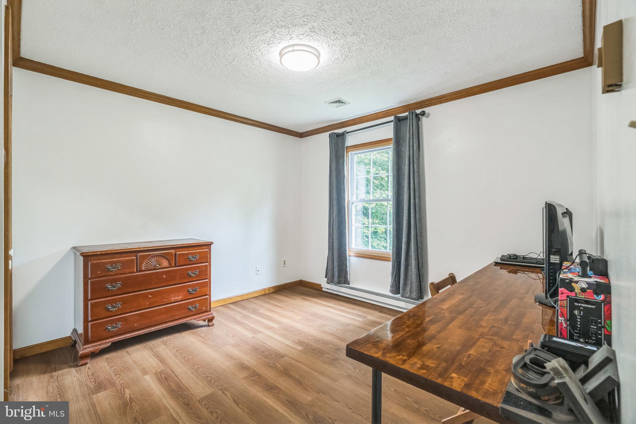 17 Oaklawn Drive Parkesburg, PA 19365 - Photo 29 of 45 a room with furniture and window