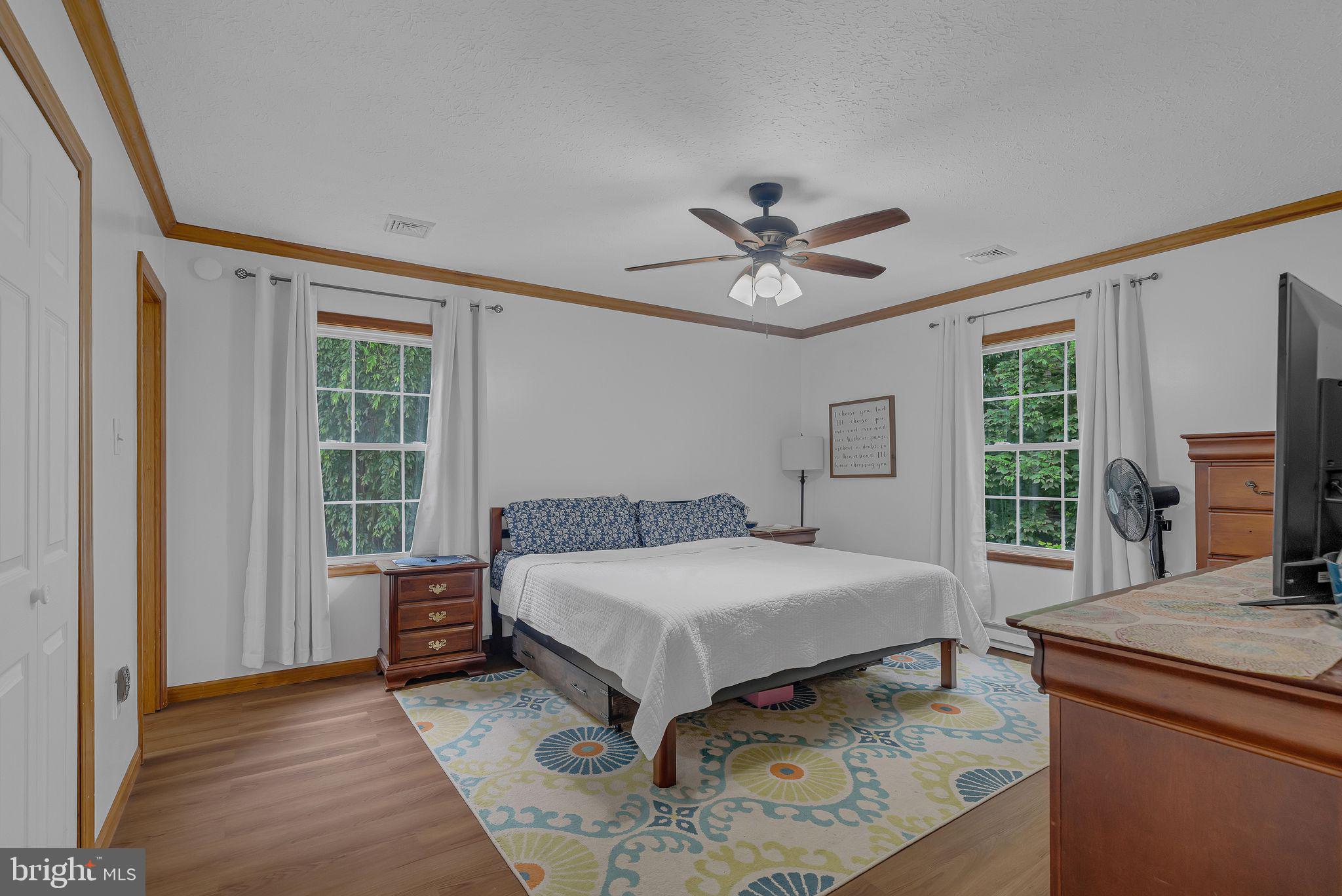 17 Oaklawn Drive Parkesburg, PA 19365 - Photo 34 of 45 a bedroom with a bed and a window