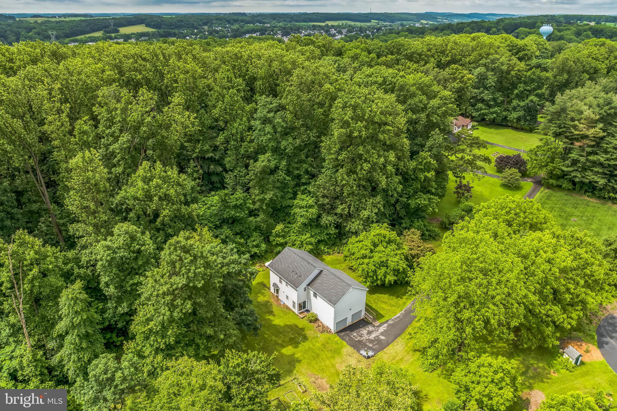 17 Oaklawn Drive Parkesburg, PA 19365 - Photo 42 of 45 a aerial view of a house with a yard and swimming pool