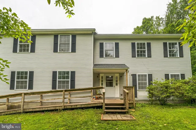 a front view of house with yard