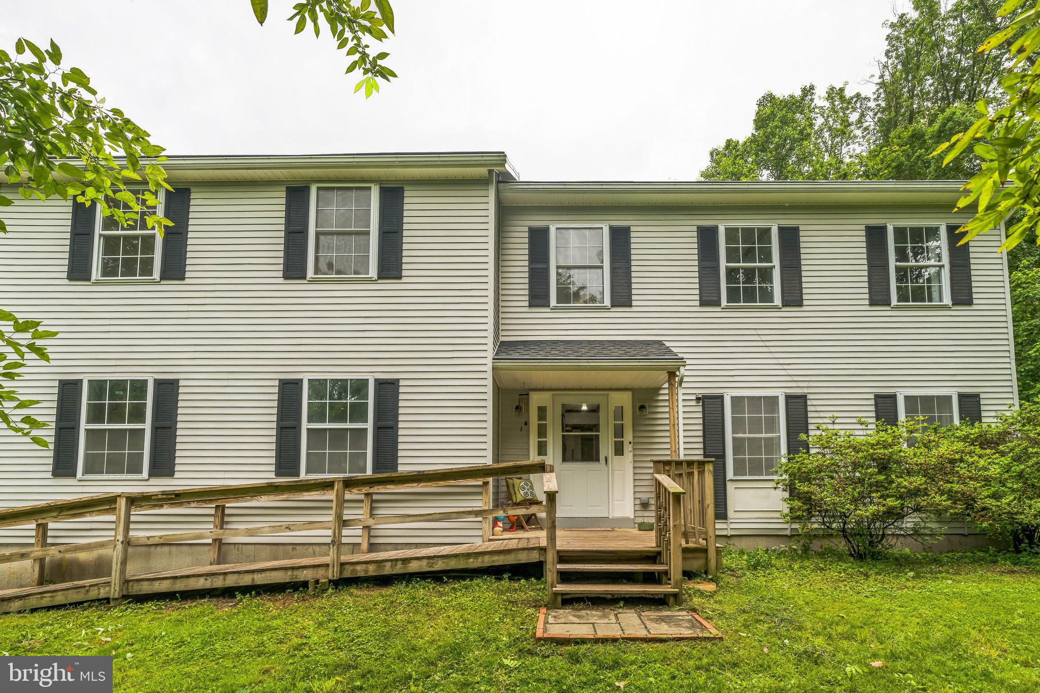 17 Oaklawn Drive Parkesburg, PA 19365 - Photo 5 of 45 a front view of house with yard