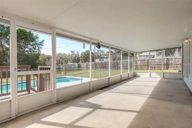 a balcony with wooden floor