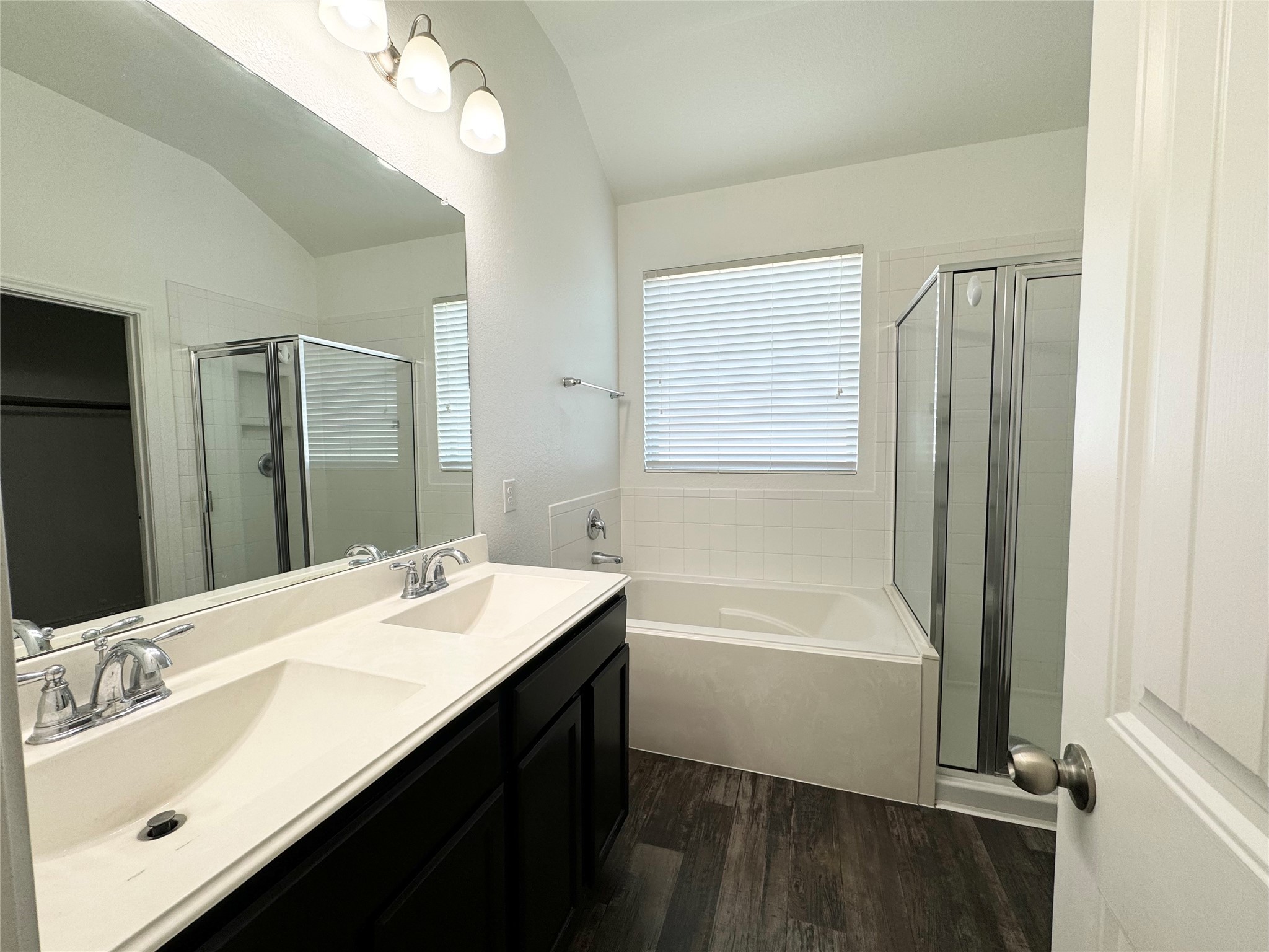 20626 Rimini River Way Katy, TX 77449 - Photo 16 of 21 a bathroom with a tub double vanity sink and mirror