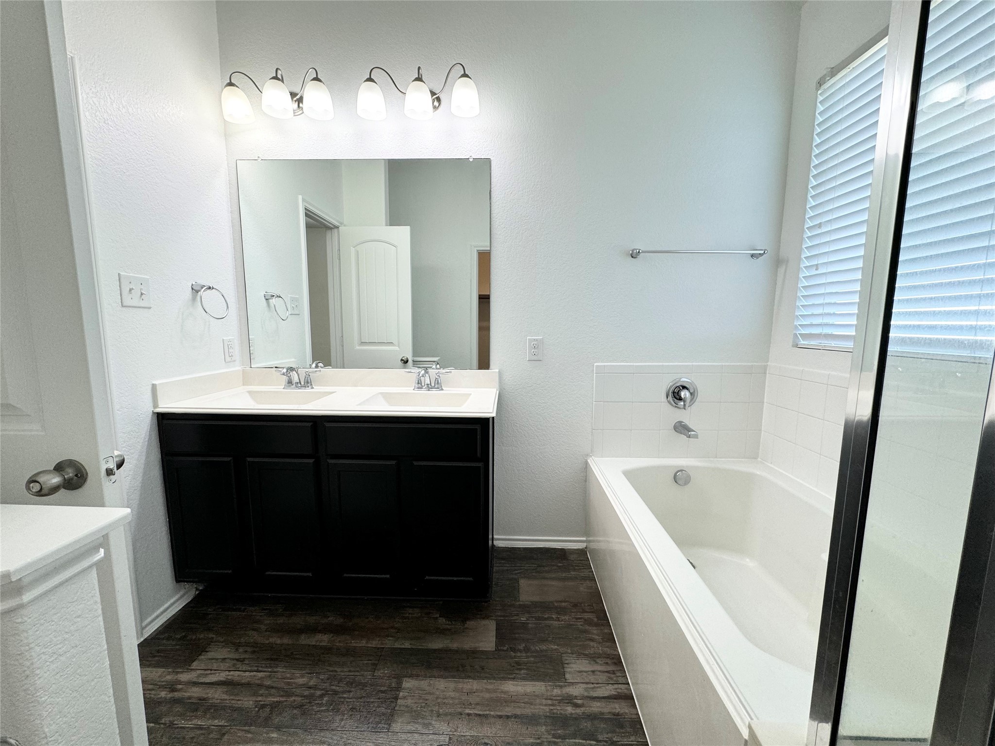 20626 Rimini River Way Katy, TX 77449 - Photo 20 of 21 a bathroom with a tub sink and mirror