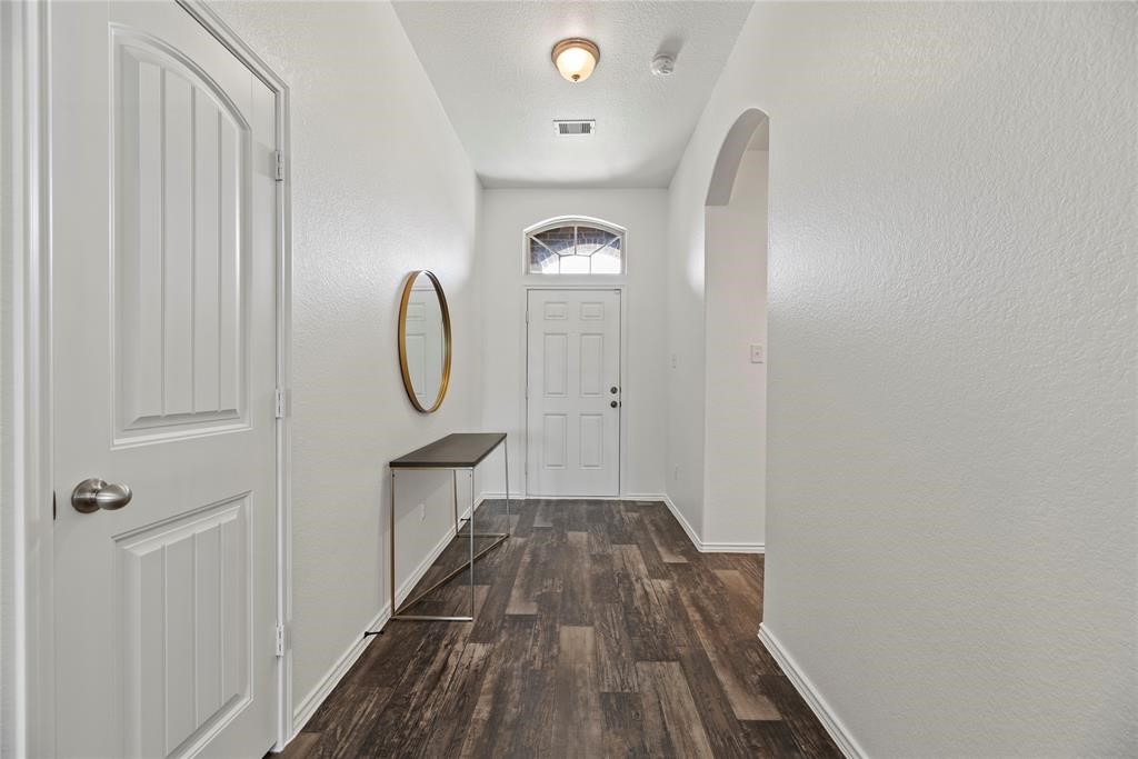 20626 Rimini River Way Katy, TX 77449 - Photo 2 of 21 a view of a hallway with wooden floor