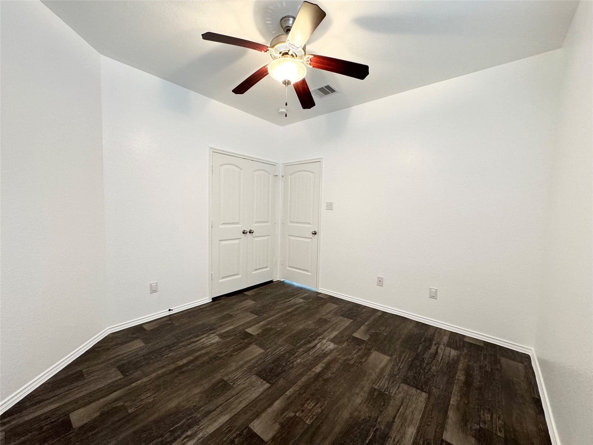20626 Rimini River Way Katy, TX 77449 - Photo 7 of 21 an empty room with ceiling fan and window