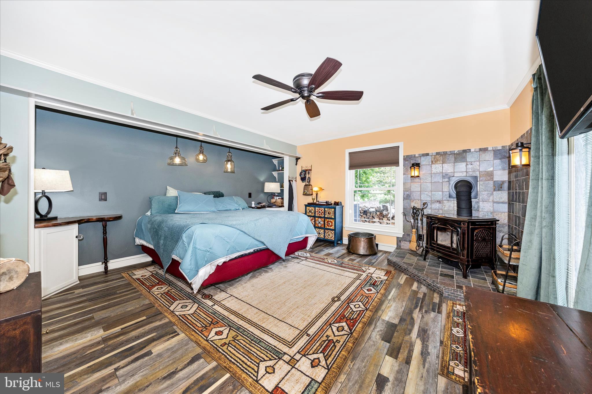 13008 Still Meadow Road Smithsburg, MD 21783 - Photo 18 of 60 a bedroom with a bed and wooden floor