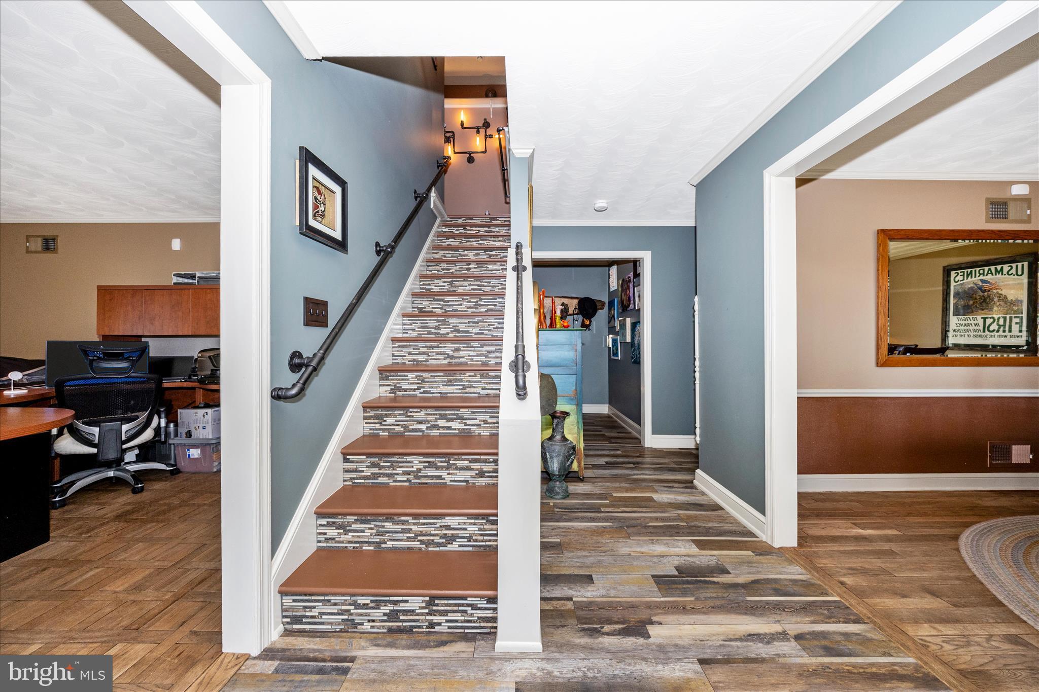 13008 Still Meadow Road Smithsburg, MD 21783 - Photo 21 of 60 a view of a hallway with wooden floor and staircase
