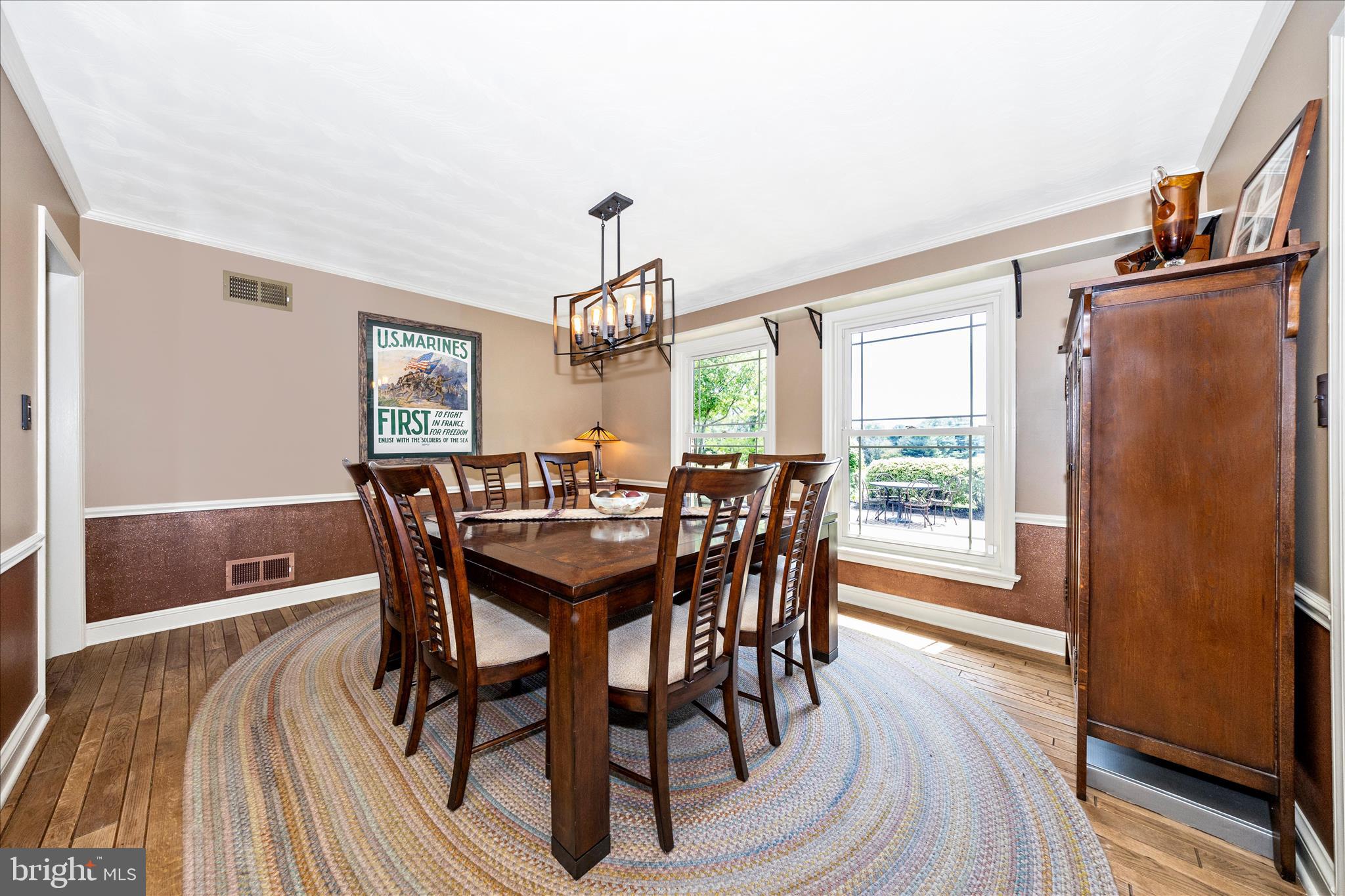 13008 Still Meadow Road Smithsburg, MD 21783 - Photo 24 of 60 a view of a dining room with furniture window and wooden floor