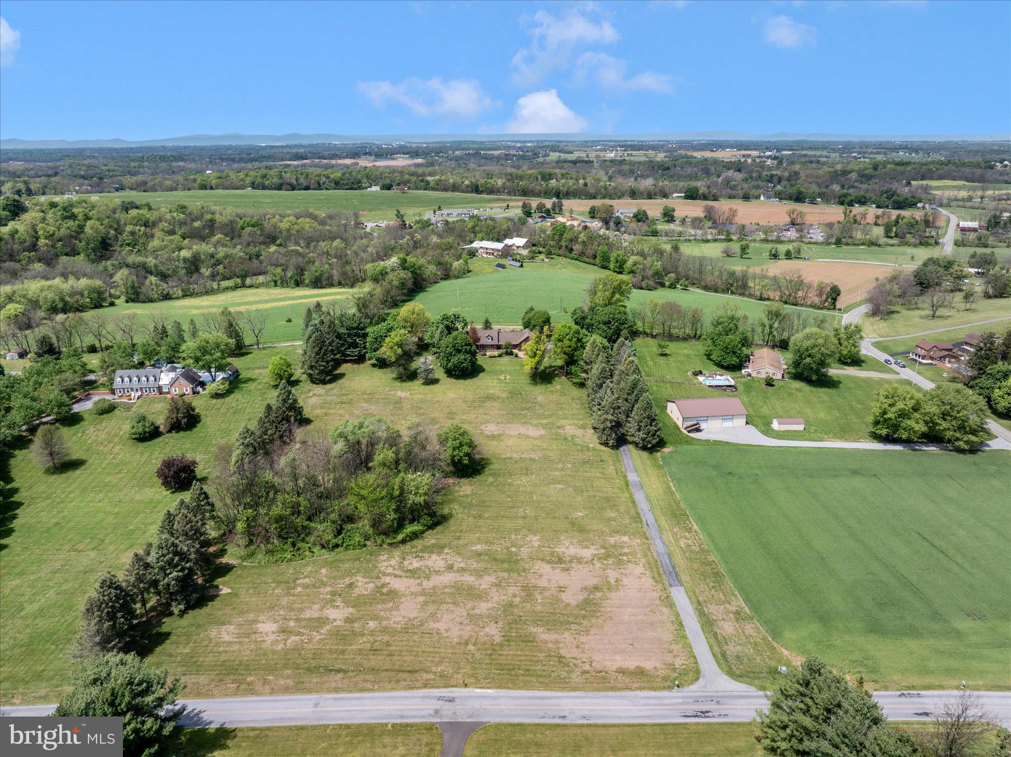 13008 Still Meadow Road Smithsburg, MD 21783 - Photo 3 of 60 an aerial view of a houses with outdoor space and trees