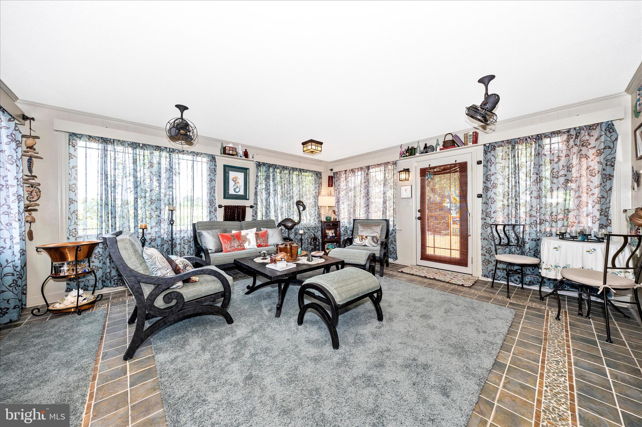 13008 Still Meadow Road Smithsburg, MD 21783 - Photo 35 of 60 a living room with furniture windows and wooden floor