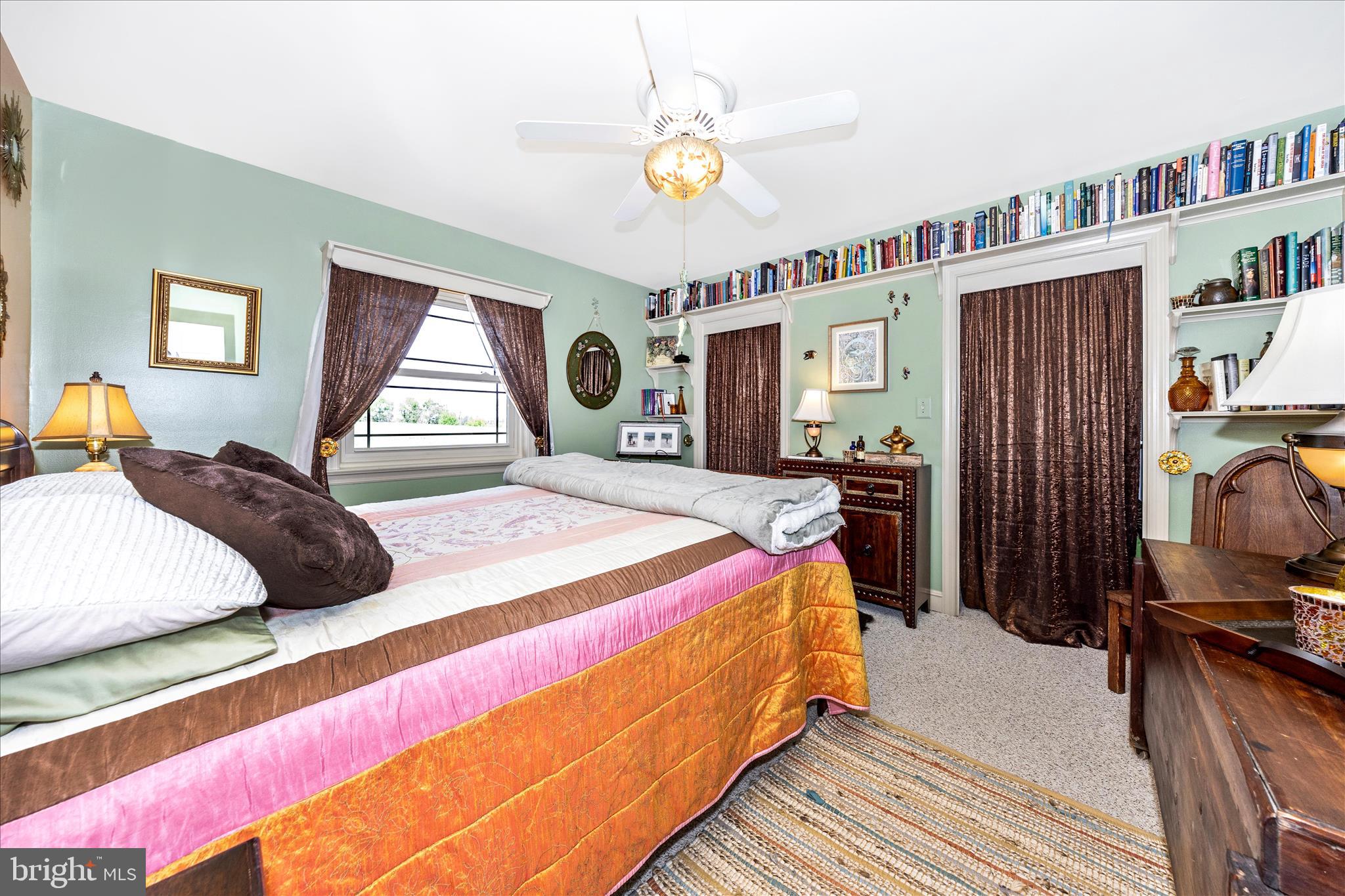 13008 Still Meadow Road Smithsburg, MD 21783 - Photo 43 of 60 a bed room with a bed and a book shelf
