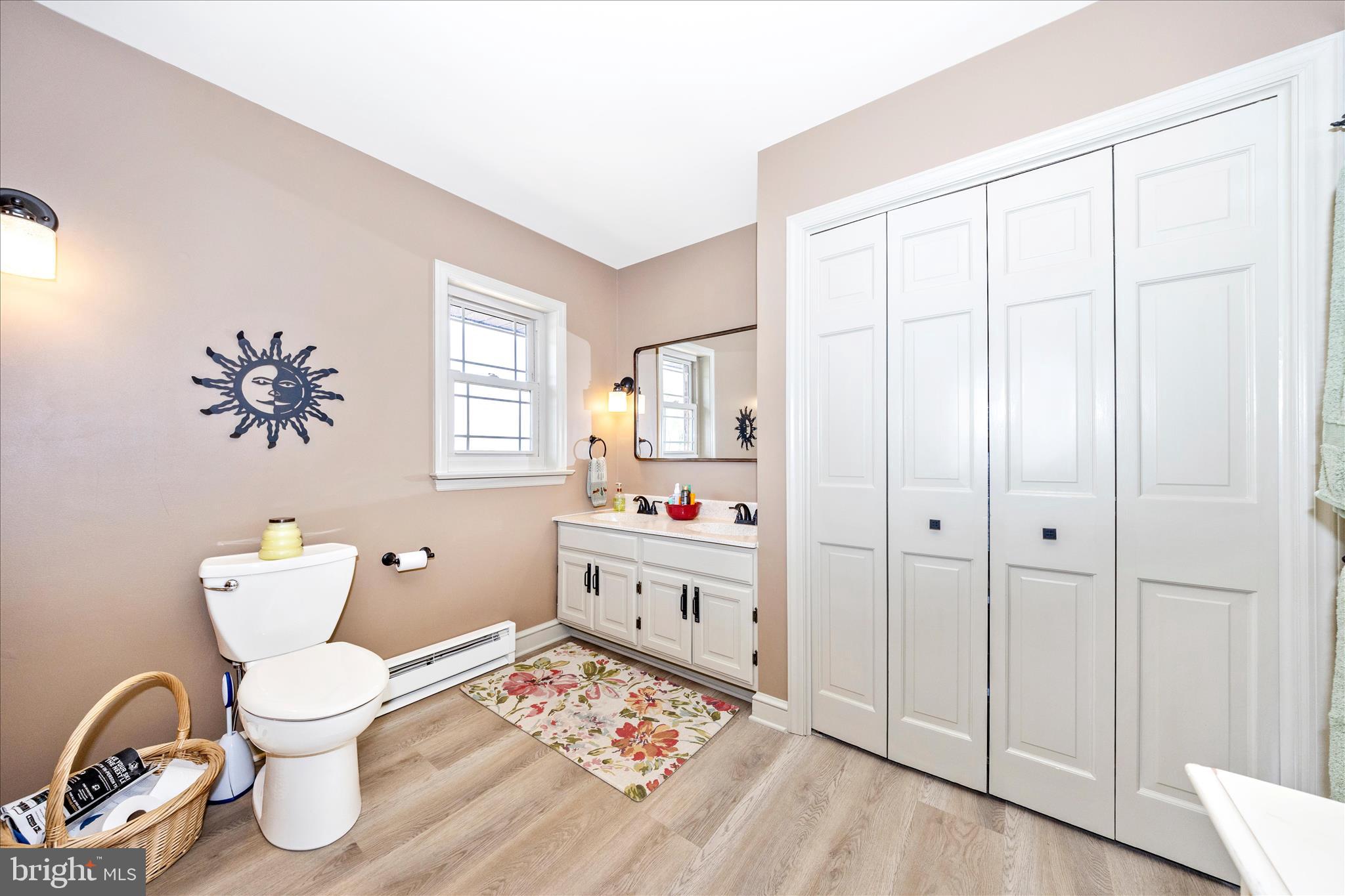 13008 Still Meadow Road Smithsburg, MD 21783 - Photo 49 of 60 a bathroom with a sink and a mirror