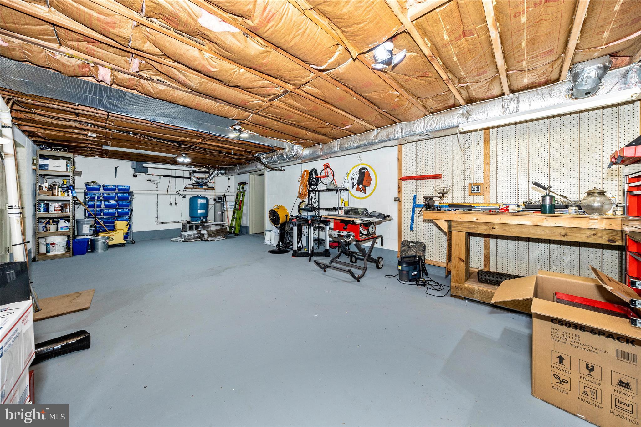 13008 Still Meadow Road Smithsburg, MD 21783 - Photo 55 of 60 a view of a storage room with a lot of stuff