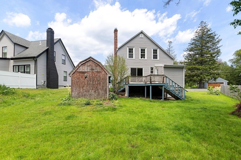 19 Butler Avenue Wakefield, MA 01880 - Photo 27 of 33 a view of a house with a yard and deck