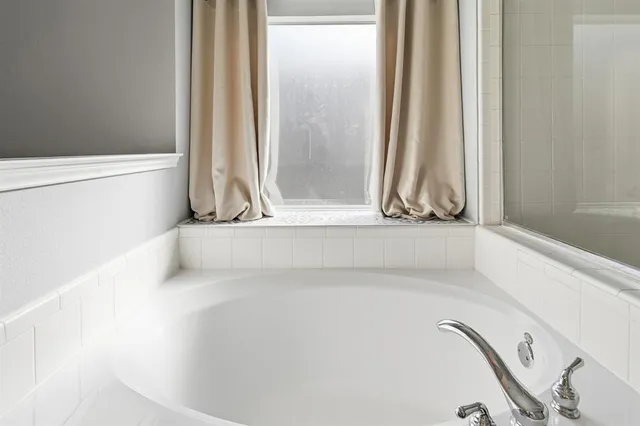 a view of a bathtub in a bathroom