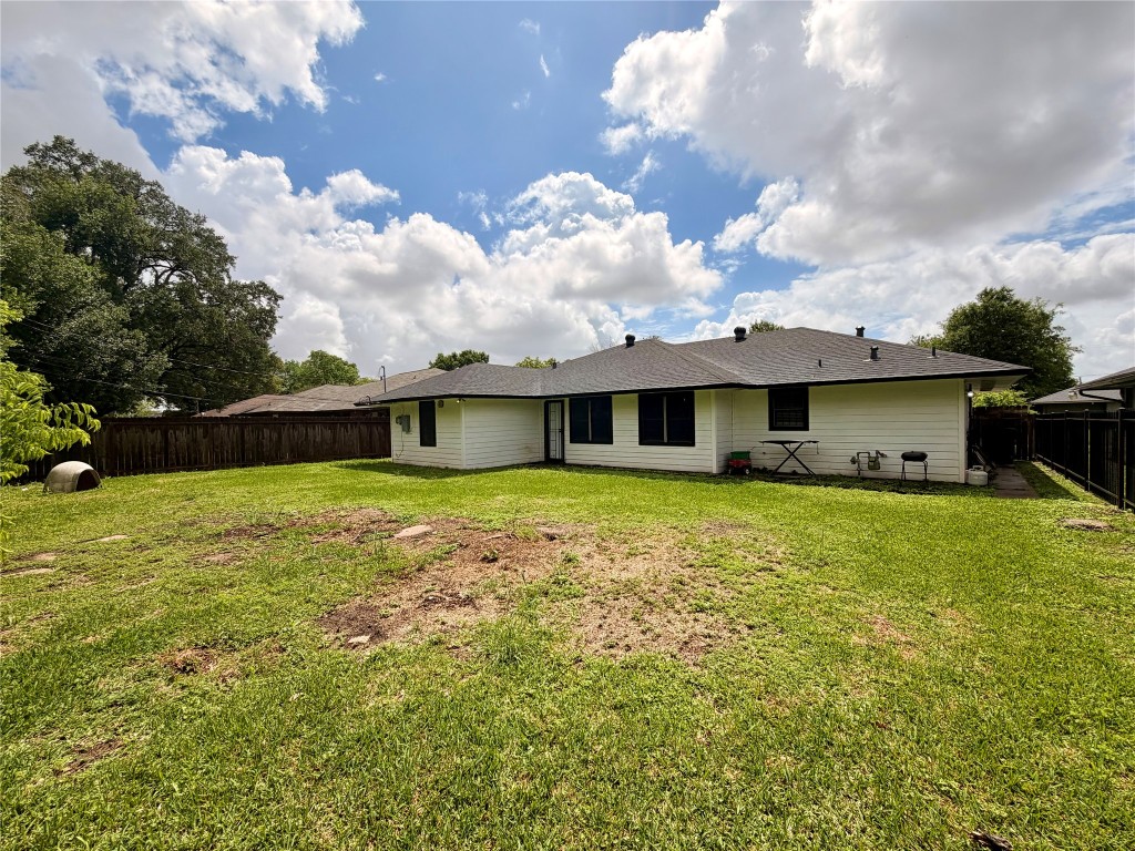 6211 Schevers Street Houston, TX 77087 - Photo 28 of 28 a front view of a house with a garden
