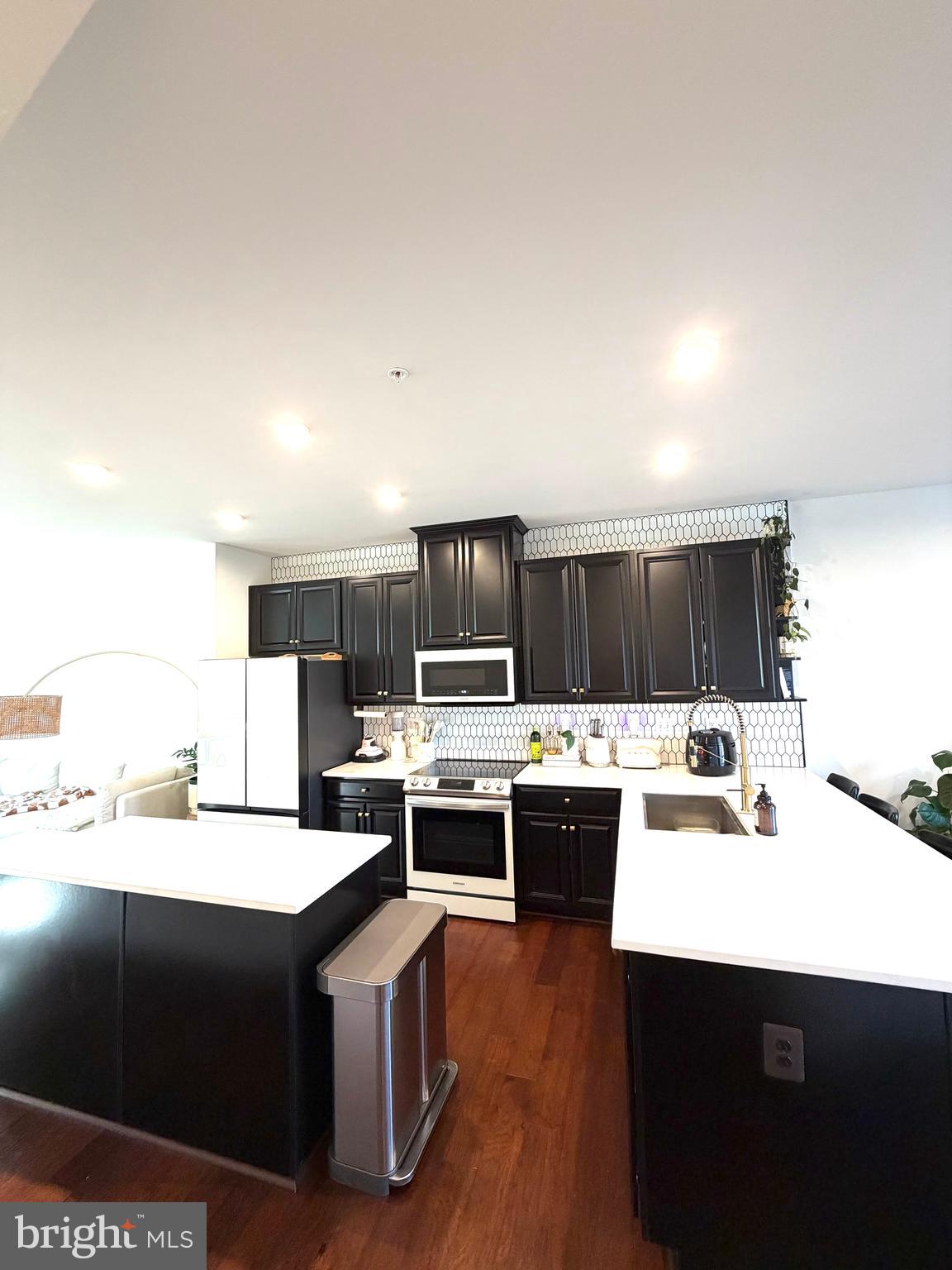 1331 Bruley Road Hanover, MD 21076 - Photo 15 of 18 a kitchen with a sink and cabinets