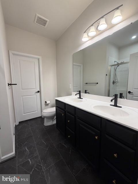 1331 Bruley Road Hanover, MD 21076 - Photo 5 of 18 a bathroom with a double vanity sink and mirror