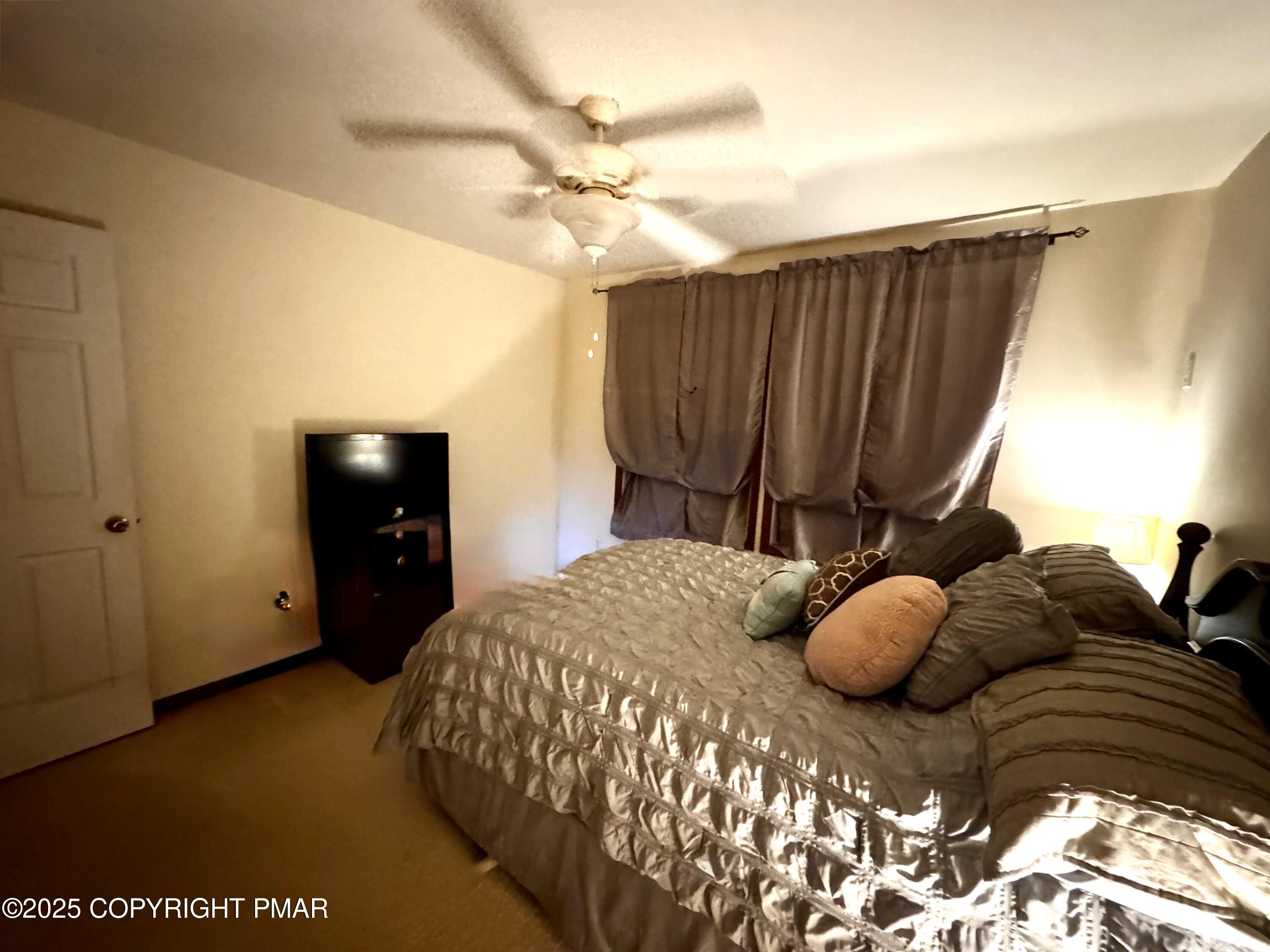 102 Indian Trail Road Jim Thorpe, PA 18229 - Photo 16 of 28 a bedroom with a bed and a closet