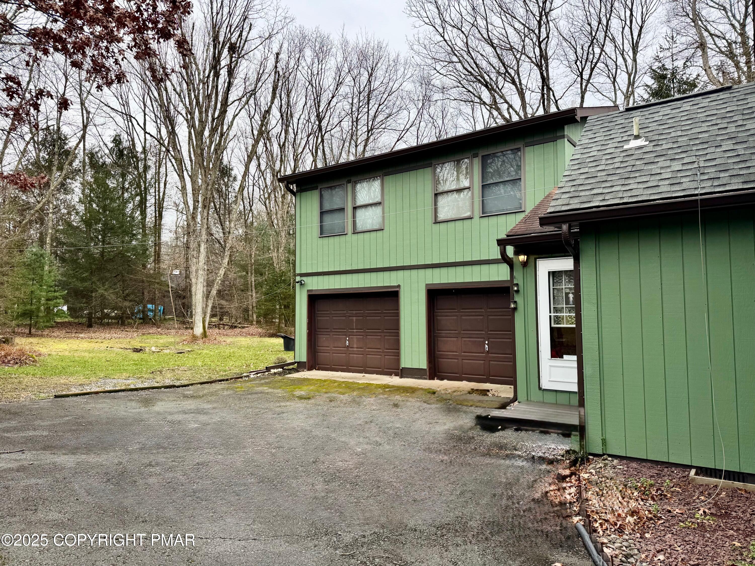 102 Indian Trail Road Jim Thorpe, PA 18229 - Photo 27 of 28 a front view of a house with a yard