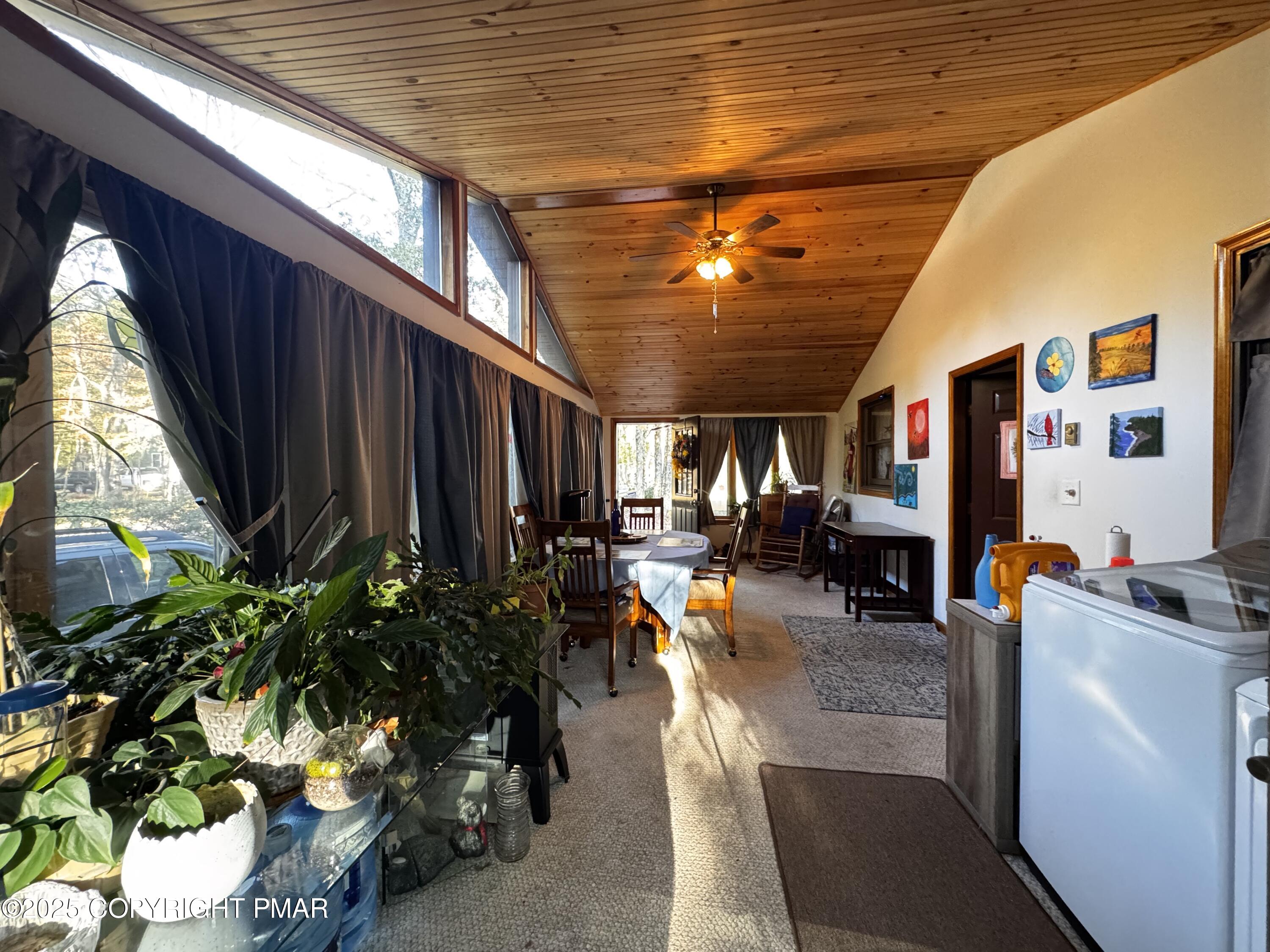 102 Indian Trail Road Jim Thorpe, PA 18229 - Photo 4 of 28 a living room with patio furniture and a potted plant