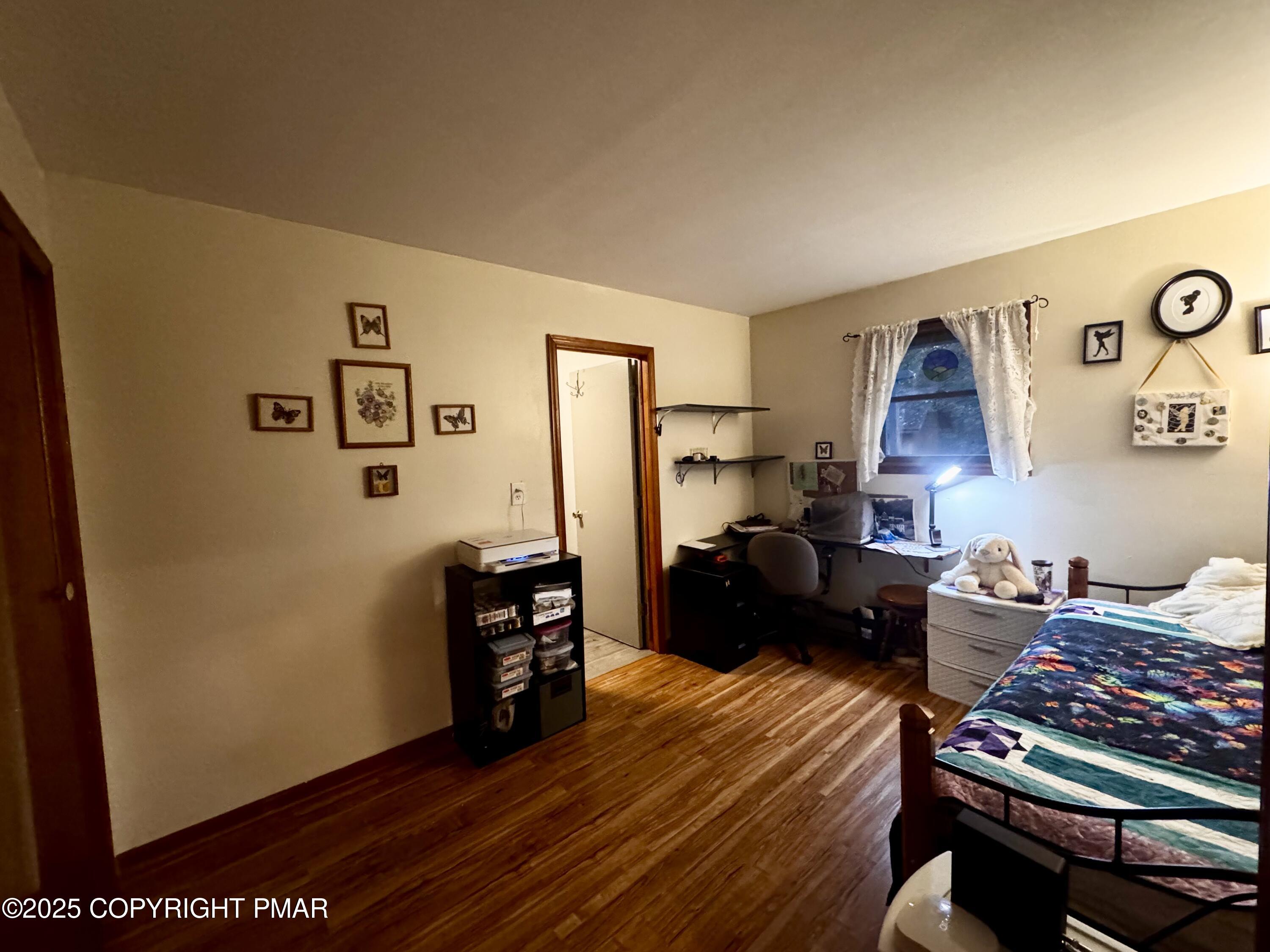 102 Indian Trail Road Jim Thorpe, PA 18229 - Photo 10 of 28 a living room with furniture and wooden floor
