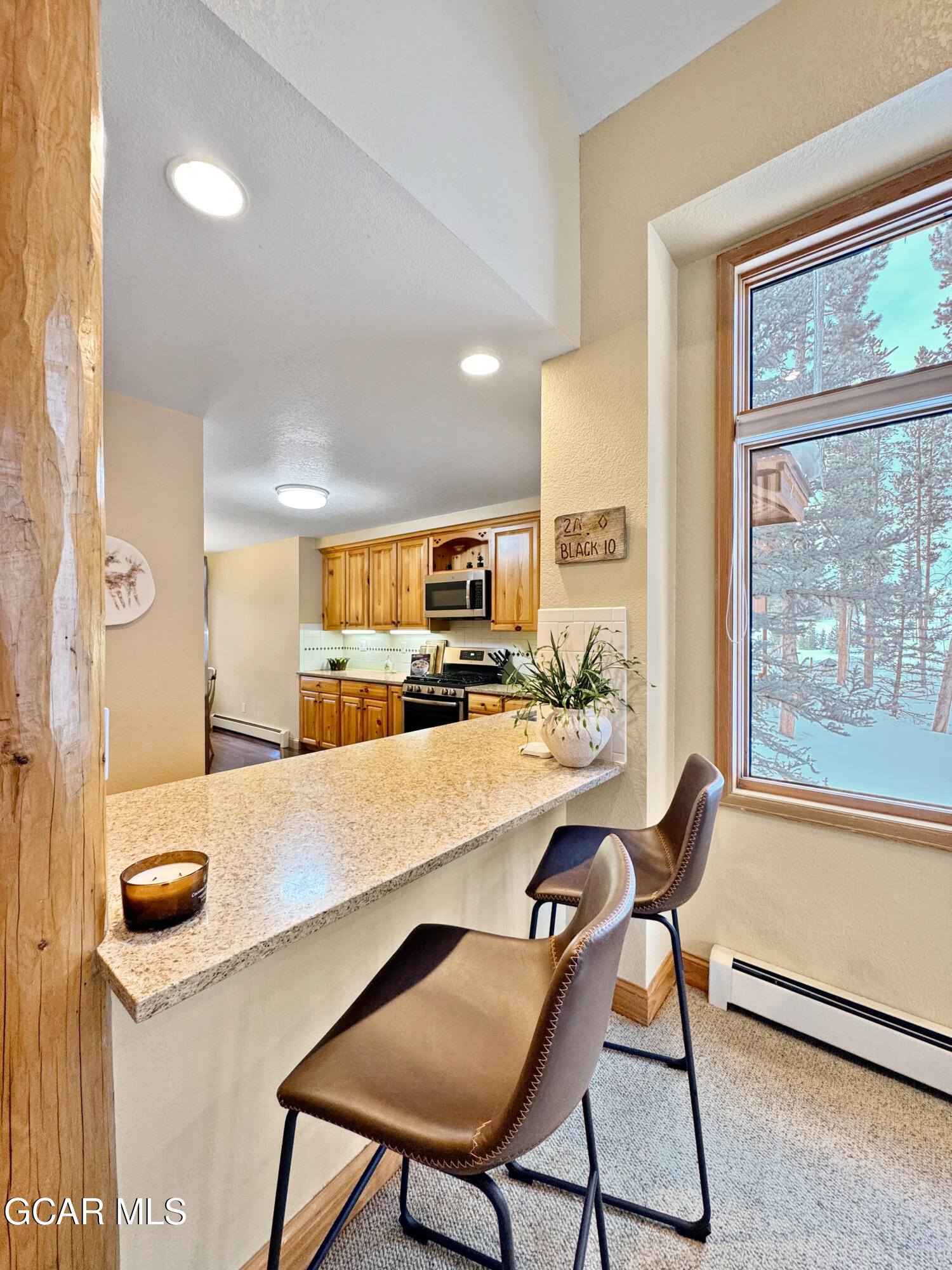 1232 Gcr 8 Tabernash, CO 80478 - Photo 12 of 51 a dining room with a table and chairs