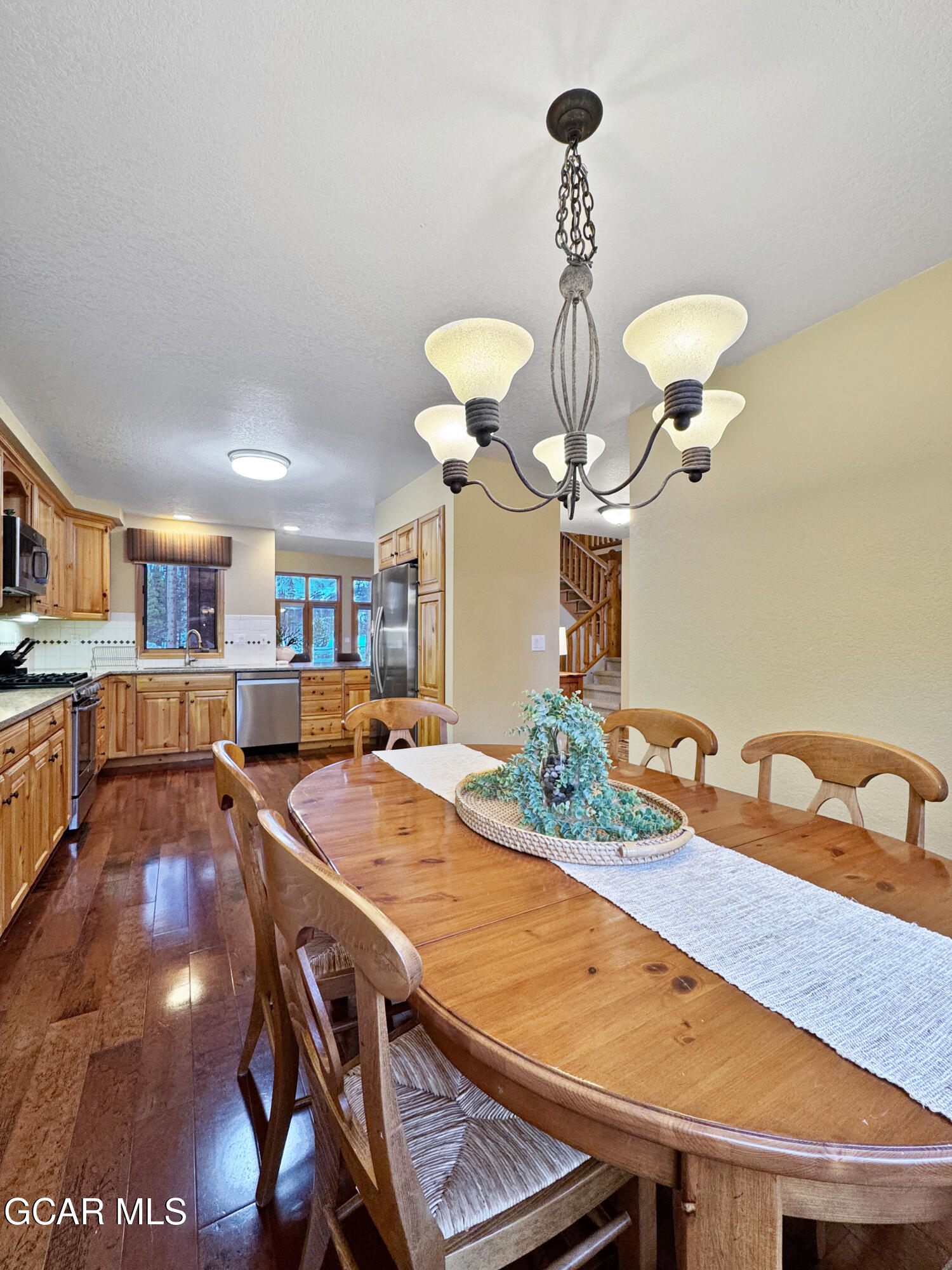 1232 Gcr 8 Tabernash, CO 80478 - Photo 15 of 51 a dining room with furniture and chandelier