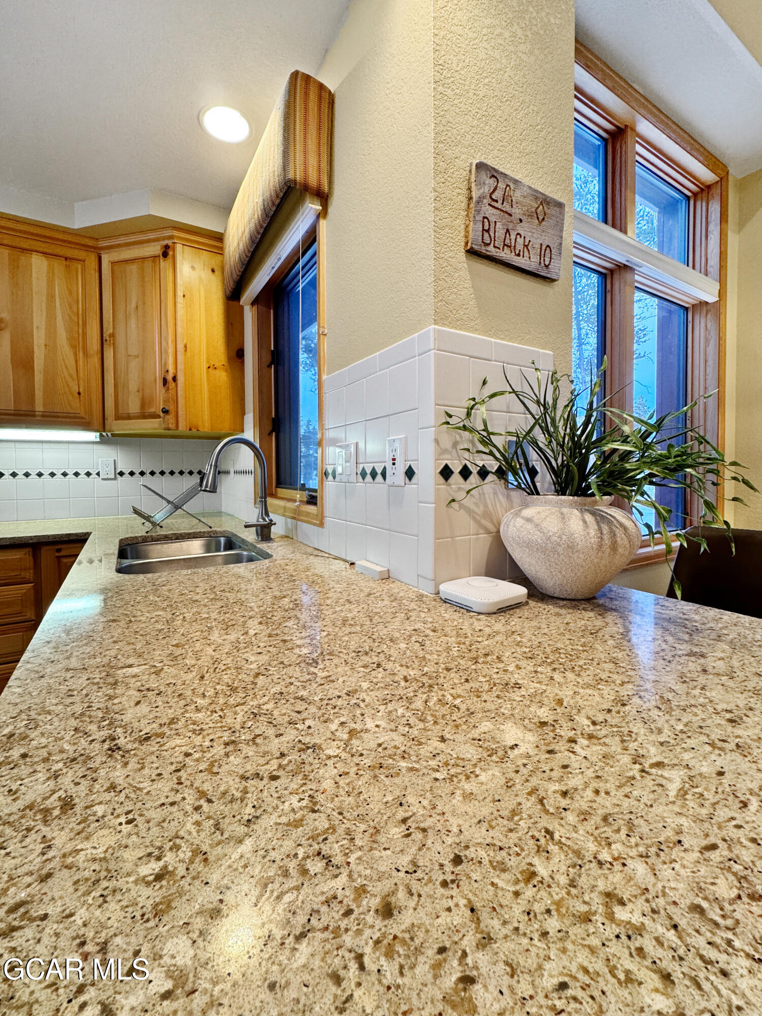 1232 Gcr 8 Tabernash, CO 80478 - Photo 17 of 51 a view of a kitchen with a sink and cabinets