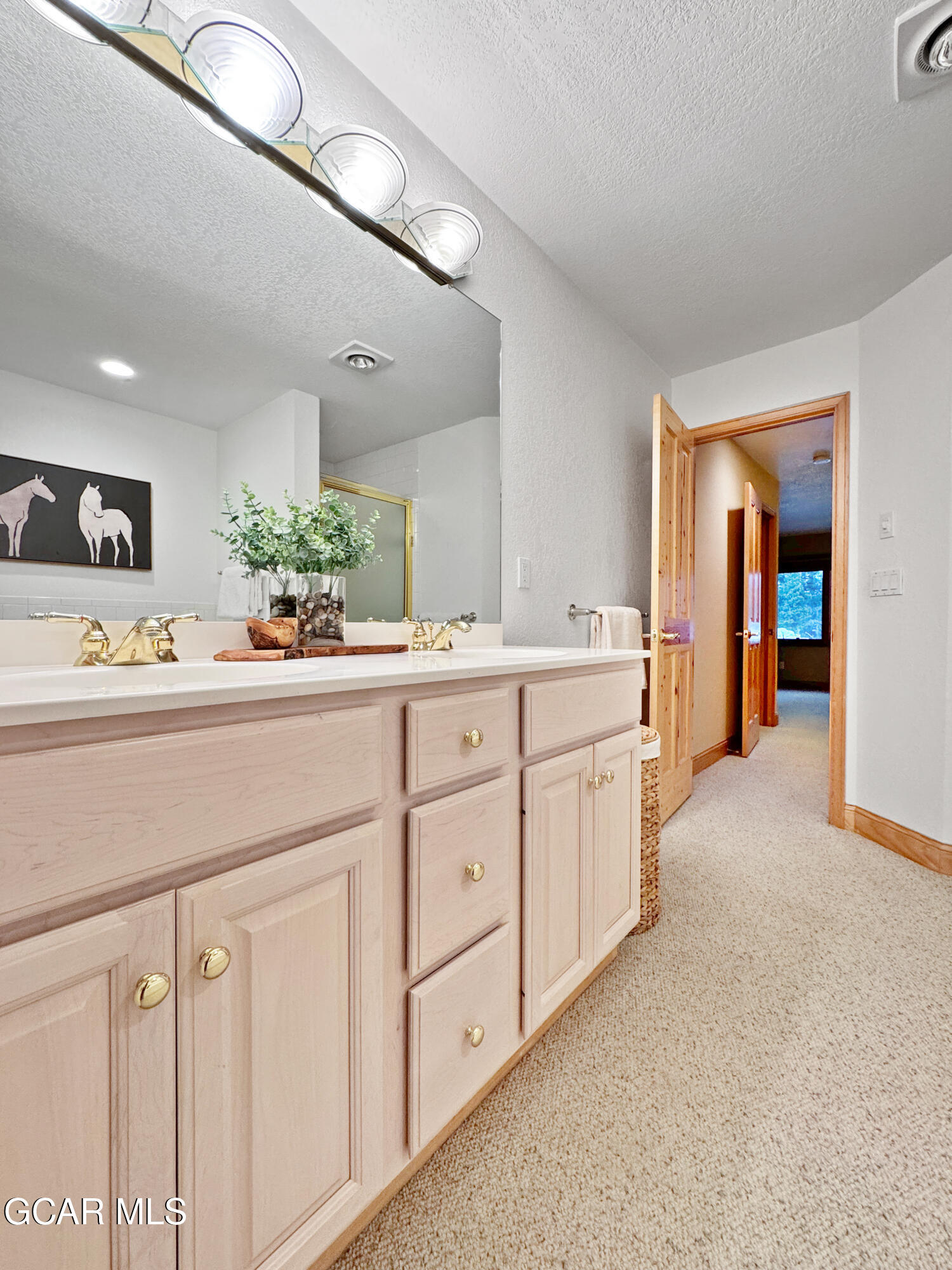 1232 Gcr 8 Tabernash, CO 80478 - Photo 24 of 51 a utility room with cabinets washer and dryer