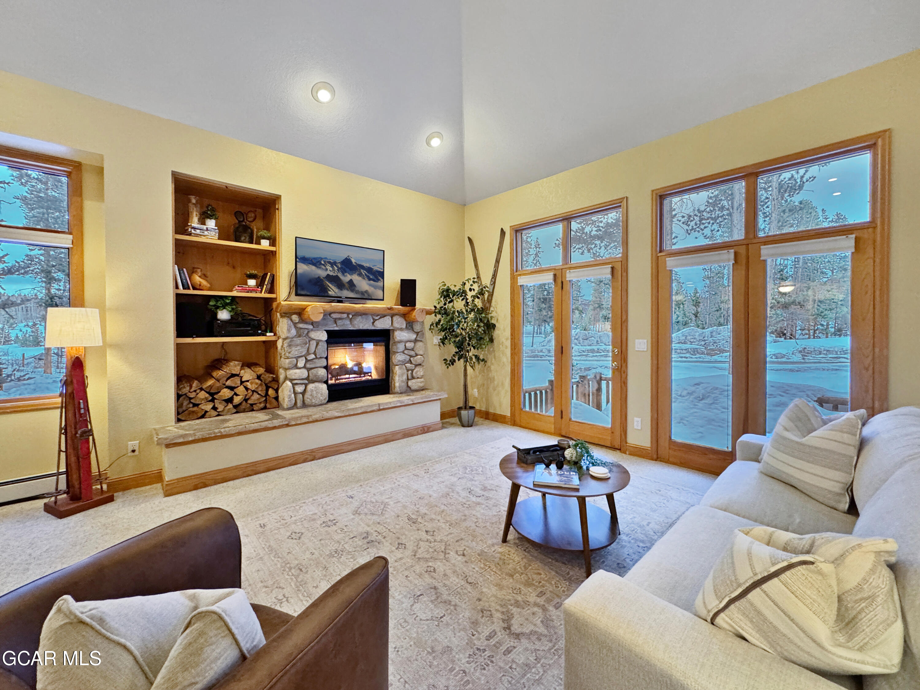1232 Gcr 8 Tabernash, CO 80478 - Photo 26 of 51 a living room with furniture a fireplace and a flat screen tv